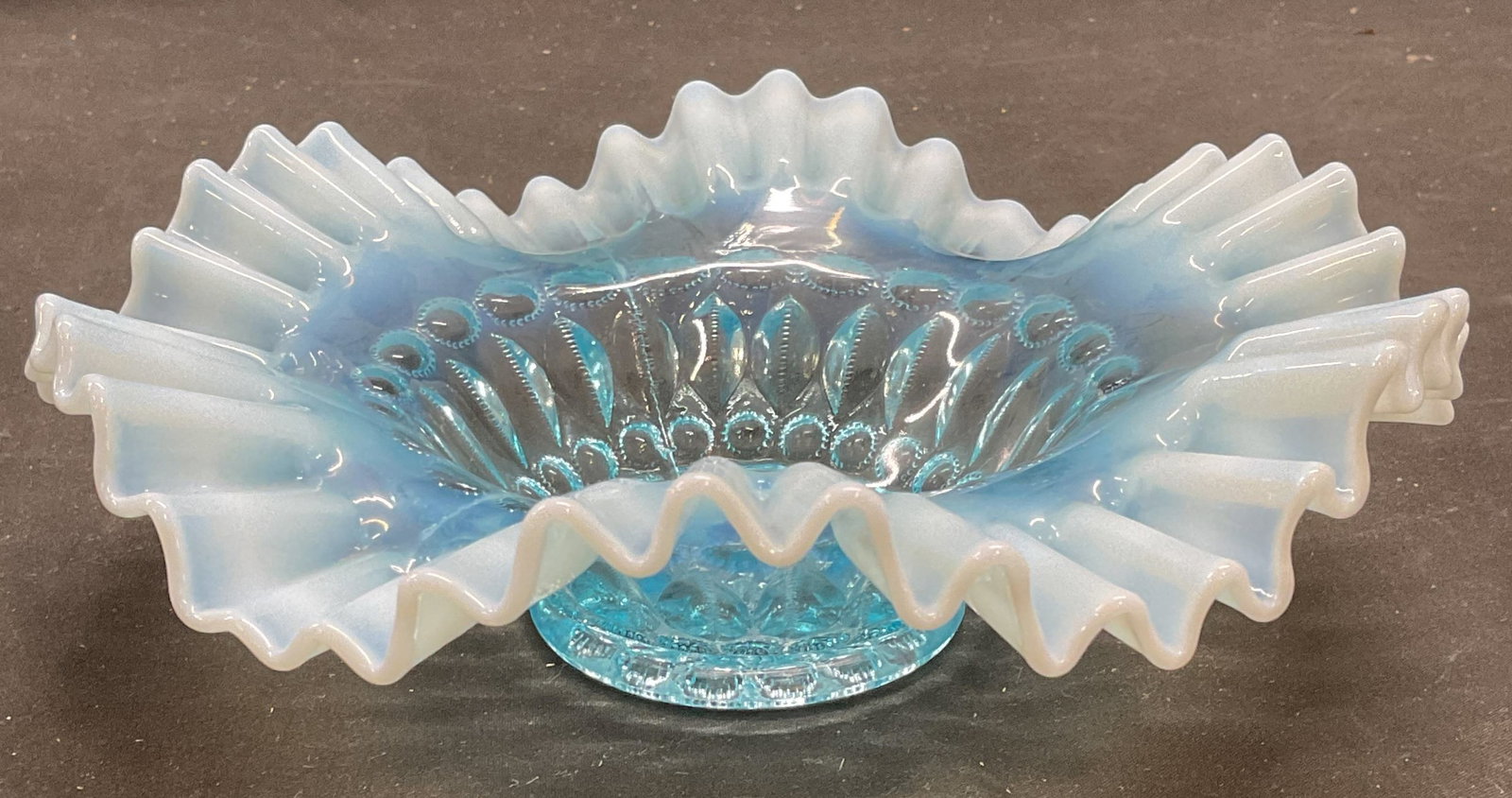 Vintage Blue Art Glass Handkerchief Bowl: Vintage blue art glass bowl. Handkerchief scalloped rim with raised bead pattern. Measures approx 8 x 2.5 inches. Minimal surface wear observed. Art glass bowl, blue bowl, handkerchief bowl, scalloped