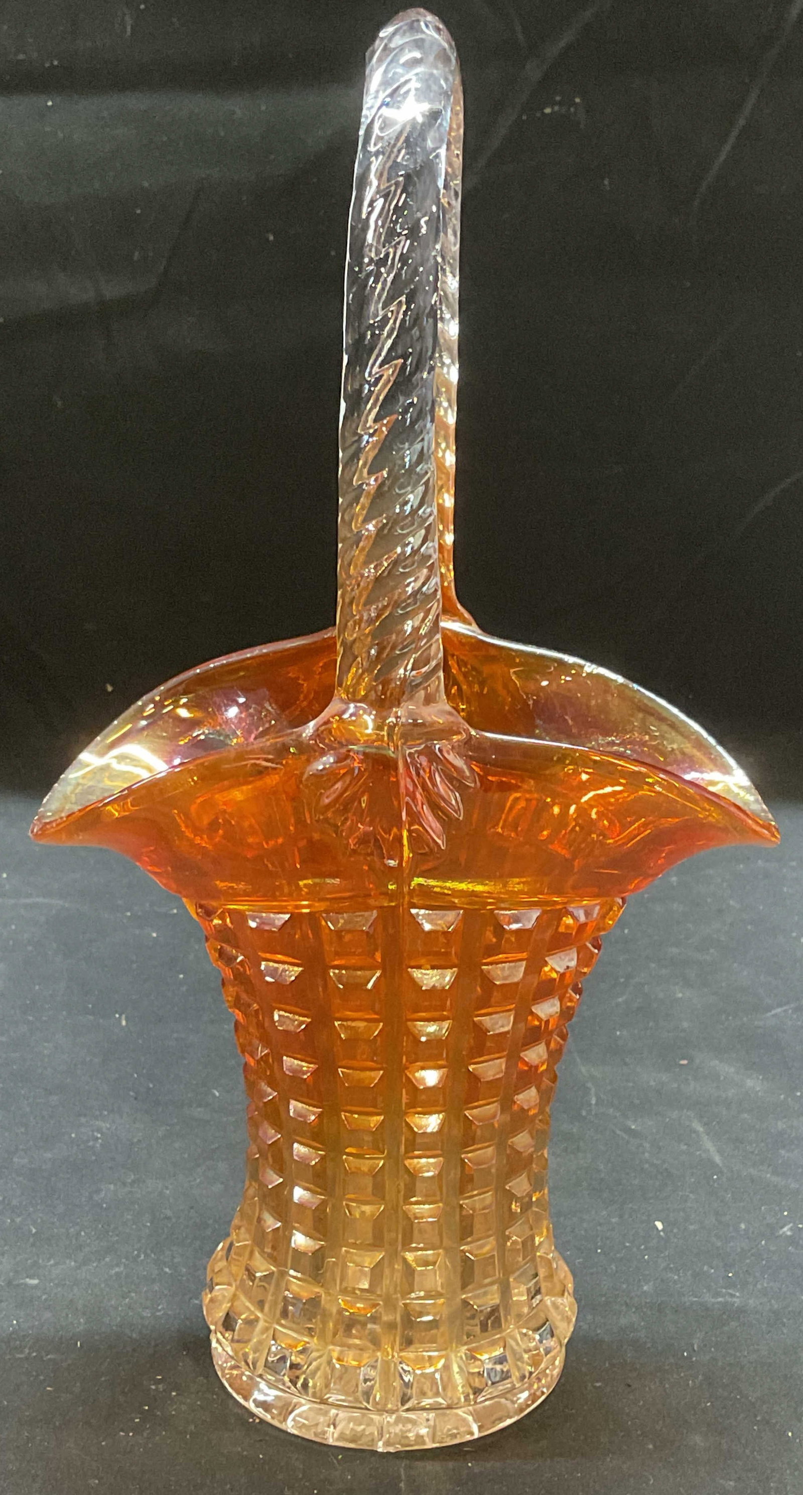 Vintage Marigold Carnival Glass Basket: Vintage marigold carnival glass basket. Raised square pattern. Measures approx 5.25 x 3 x 9.5 inches. Minimal surface wear observed. Art glass basket, marigold basket, carnival glass basket, collectib