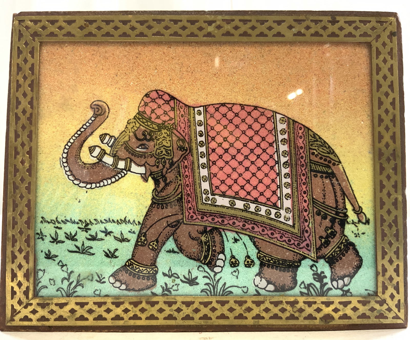Indian Wood Jewelry Box W Reverse-Painted Elephant: Jewelry box is wooden. Underside and interior are lined with red toned crushed velvet. Box has glass panel Inside lid with reverse painted detail of elephant. Measures approximately 5.5 inches long 4.
