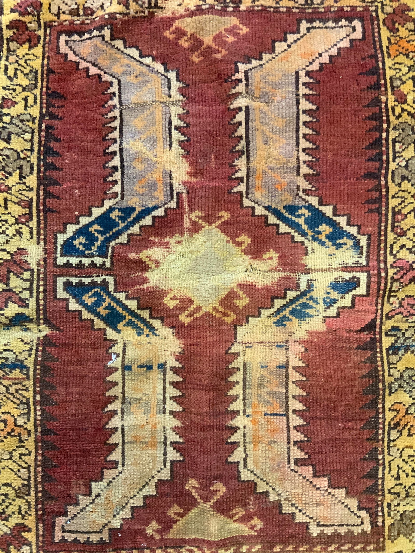 Antique Handmade Wool Turkish Rug W Fringes: Rug is handmade and wool. Piece is antique. Appears to be Turkish. Rug has intricate multi toned geometric detail & fringes at edges. Rug measures approximately 33 inches long 22 inches wide. Rug, car