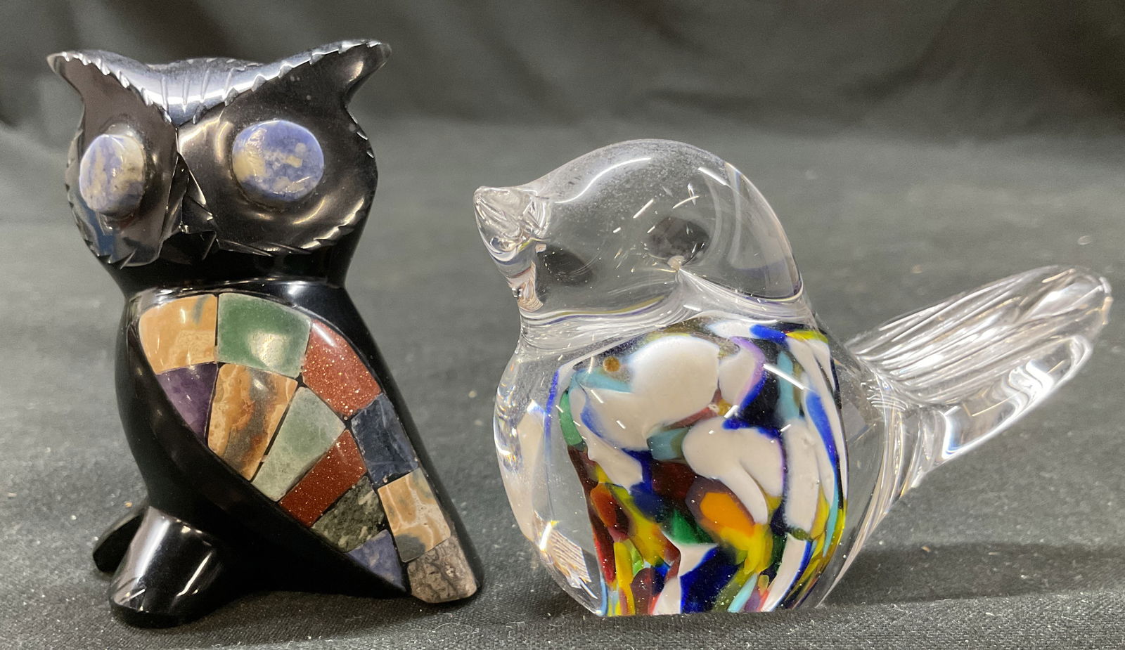 Lot 2 Art Glass Carved Obsidian Bird Owl Figurines: Lot 2 Art glass carved black obsidian bird and owl figurines. Lot includes one clear glass bird with colorful inner glass design and one carved black stone, appears to be obsidian material, owl with c