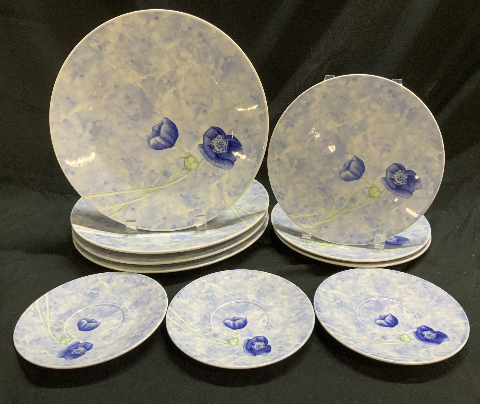 10 Pagnossin Blue Poppies Ironstone Plates ITALY: 10 Pagnossin Blue Poppies Ironstone Plates ITALY Lot includes, 3 saucers, 3 salad plates & 4 dinner plates. Pieces are ironstone material & feature a blue poppies design on a sponged blue underglaze.