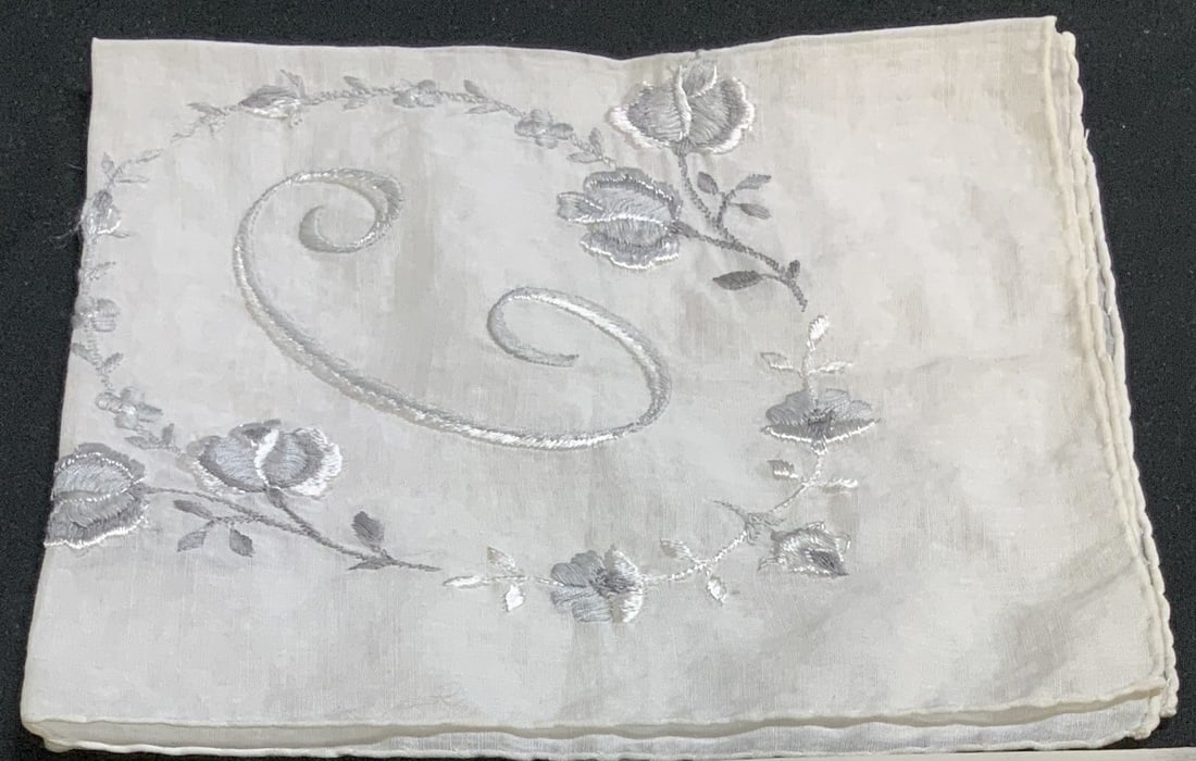Vntg White Embroidered Floral Silk Handkerchief: Vntg White Embroidered Floral Silk Handkerchief Handkerchief appears to be silk material & features a raised embroidered floral design. Bottom left has a monogram C. Surface wear consistent to age, us