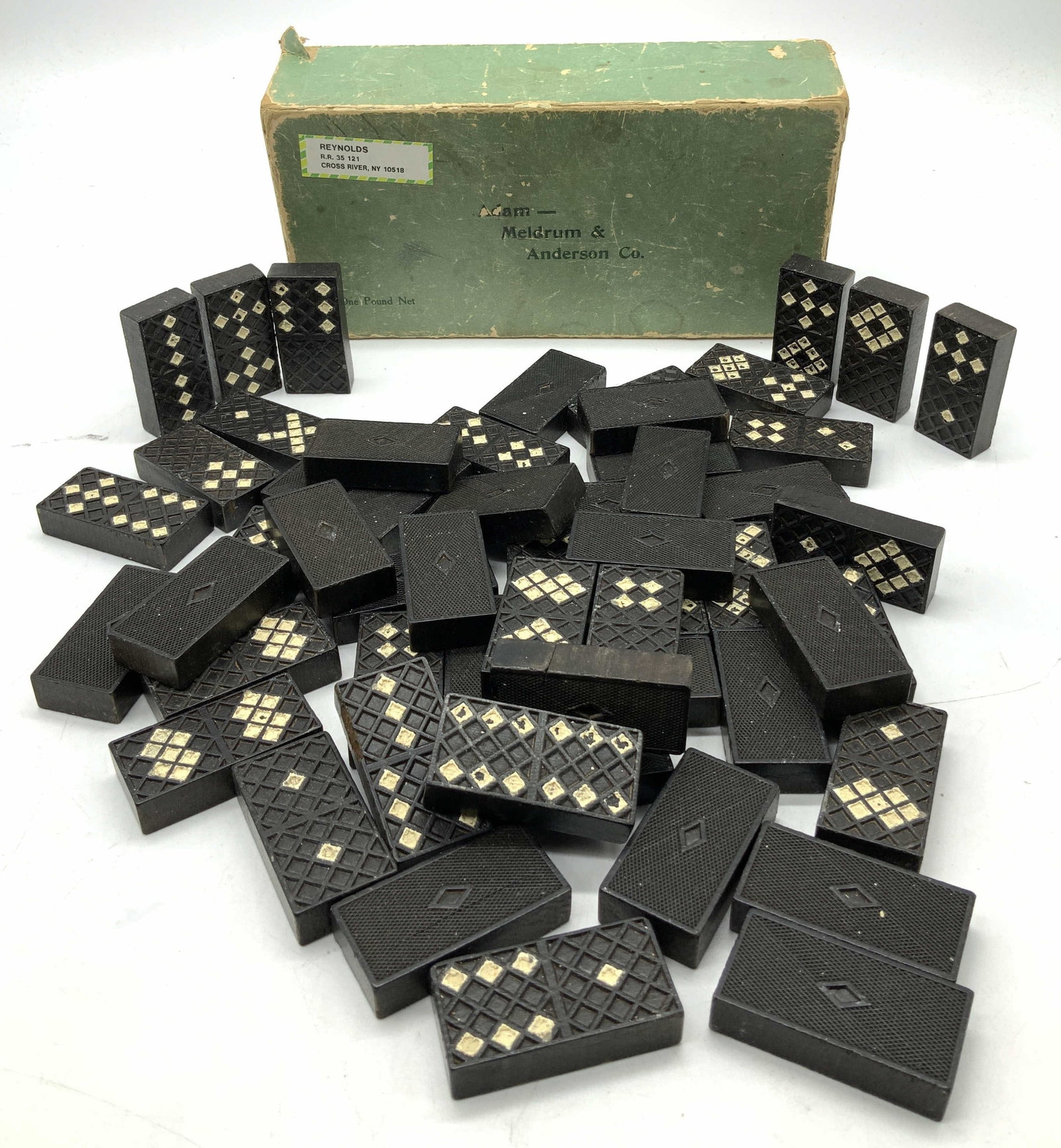 Vntg 15+ Adam-Meldrum Wooden Diamond Dominos W Bx: Vntg 15+ Adam-Meldrum Wooden Diamond Dominos Box reads, Adam-Meldrum & Anderson Co. Lot includes 15+ dominos featuring a textured & diamond-patterned design. Dominos appear to be wooden. Surface wear 