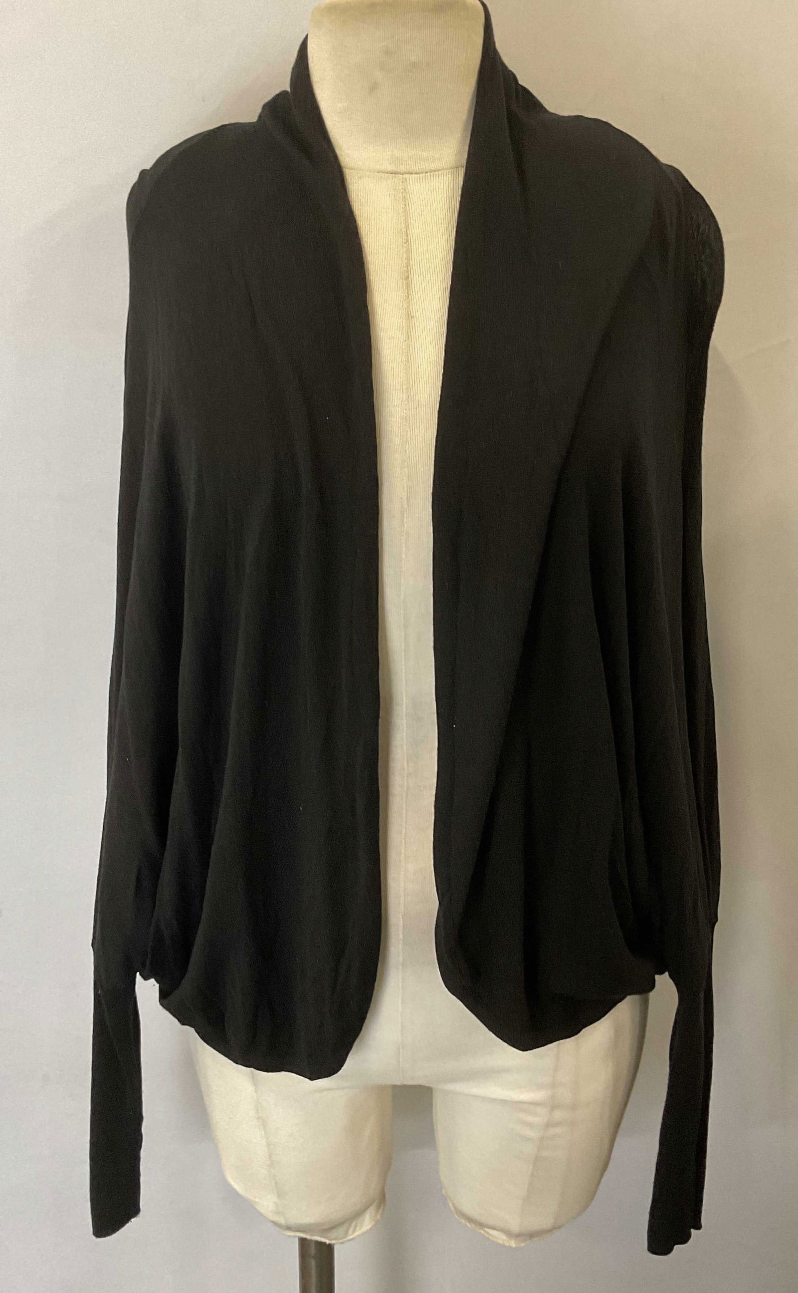 Calvin Klein Black Silk Dolman Sleeve Cardigan: Calvin Klein black silk and rayon blend open cardigan sweater dolman sleeve. Size 0x. Some wear to material consistent with exposure. Calvin Klein sweater, Calvin Klein cardigan, designer sweater, des