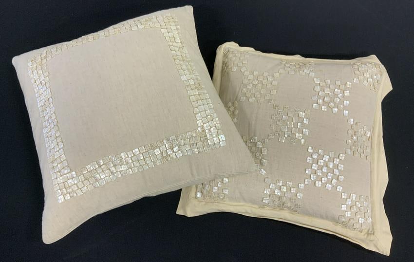 Lot 2 DRANSFIELD & ROSS Throw Pillows, India: Lot of two DRANSFIELD & ROSS throw pillows. Both are affixed with mother of Pearl buttons and accents. The labels read as DRANSFIELD & ROSS, MADE IN INDIA. Underside of larger pillow is missing a butt