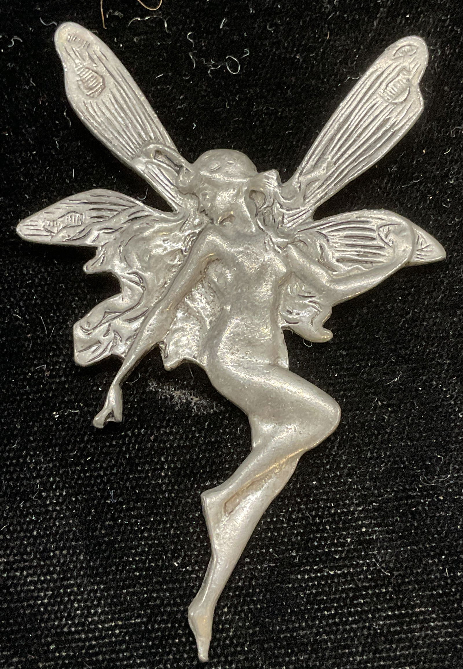 Signed Une H Lewter Fairy Pendant 3 In L: Signed pewter fairy motif pendant. Signed, appears Une H. Measures approx 3 x 2 inches. Some wear including scratching. Jewelry, estate jewelry, costume jewelry, cocktail jewelry, fashion jewelry, acc