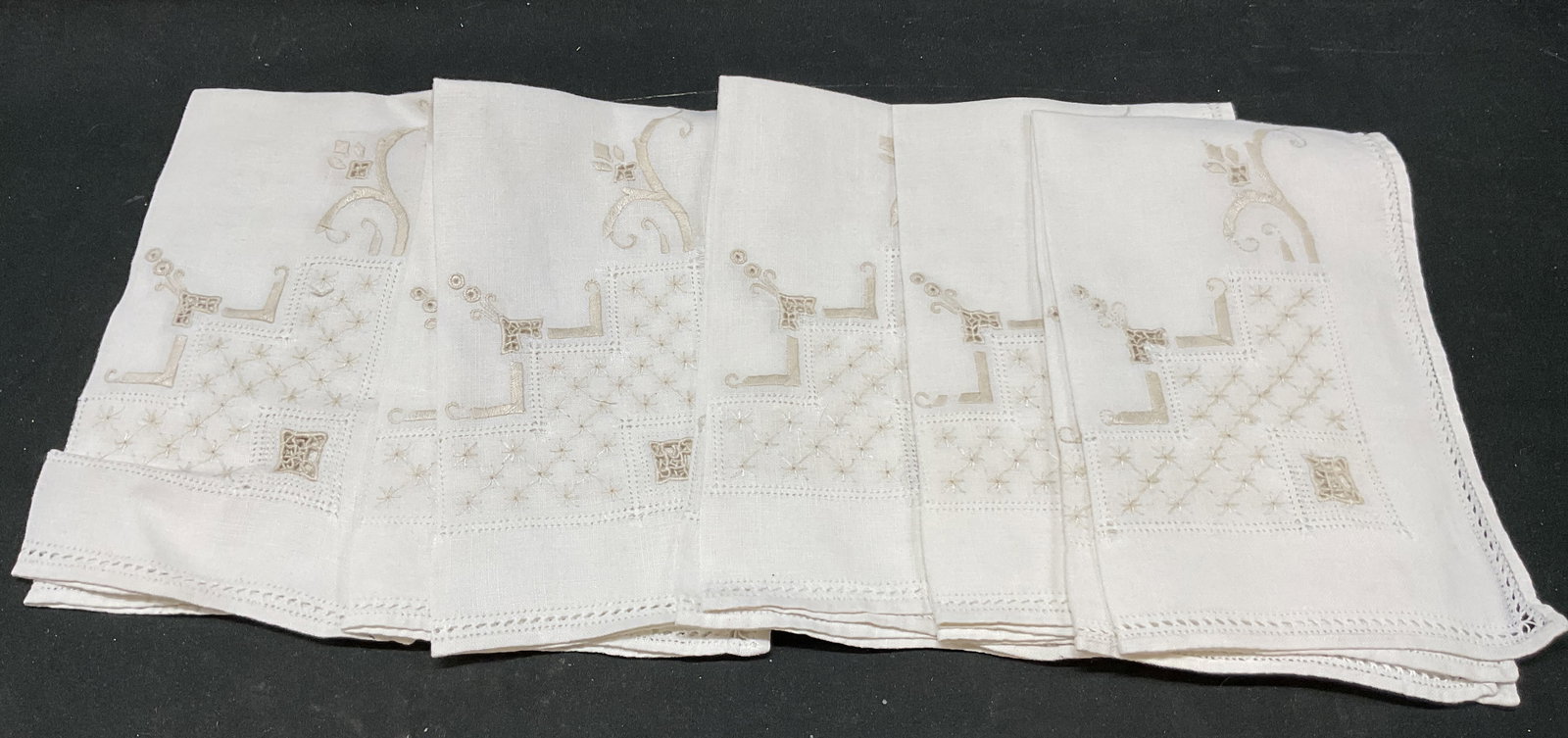 Set 5 Table Linen Embroidered Art Deco Tea Towels: Set 5 table linen embroidered art deco tea towels. Embroidered, cut out geometric floral art deco pattern designs. Measures 16 x 9.5 inches. Some surface wear consistent with exposure. Table linen, em