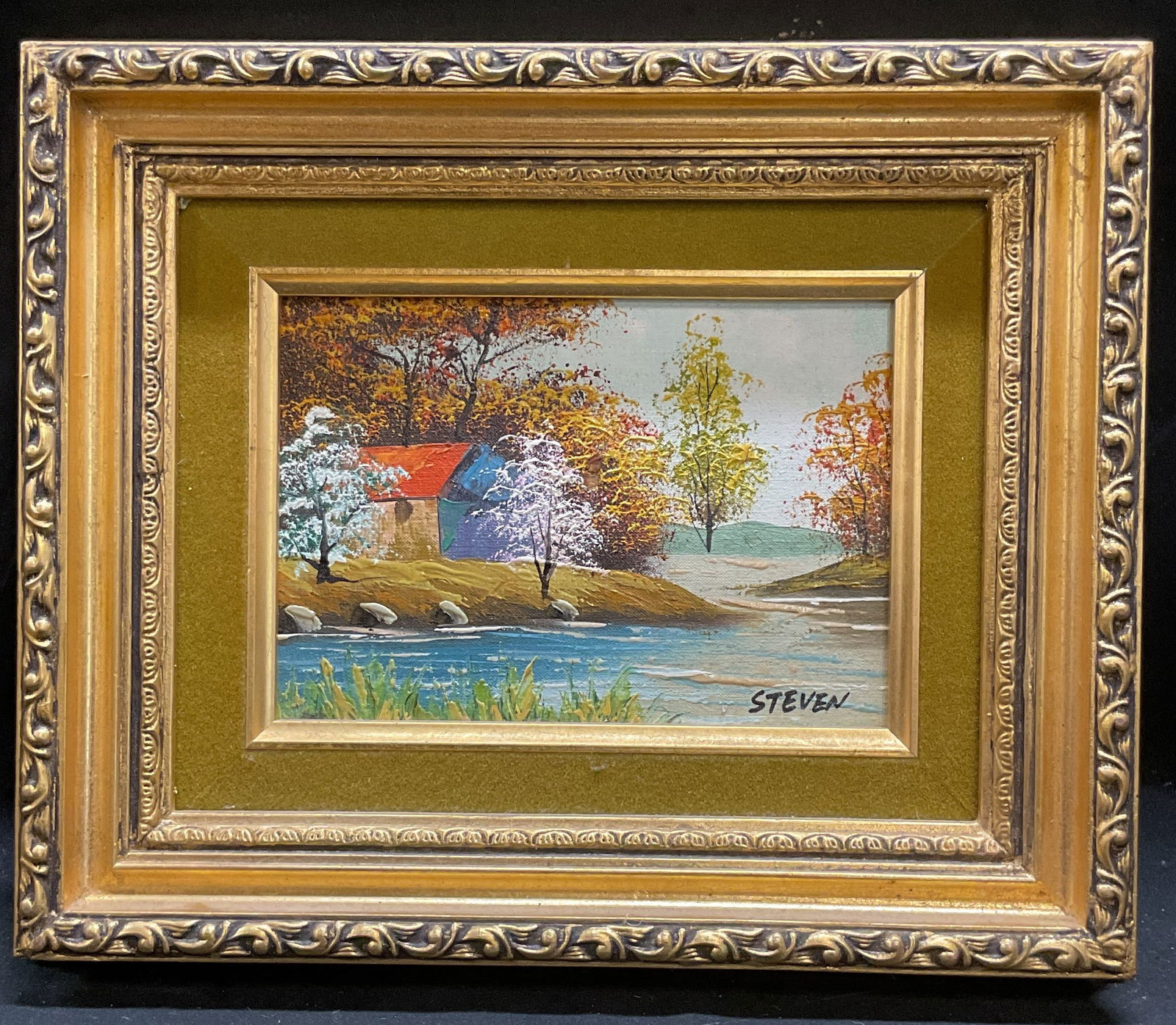 Signed Steven Pastoral Landscape Oil Painting: Framed oil on panel painting. Signed at lower left, Steven. Label on verso Genuine Oil Painting by Steven. Hand painted in Taiwan. Rosstex International Corporation. Pastoral landscape scene with view