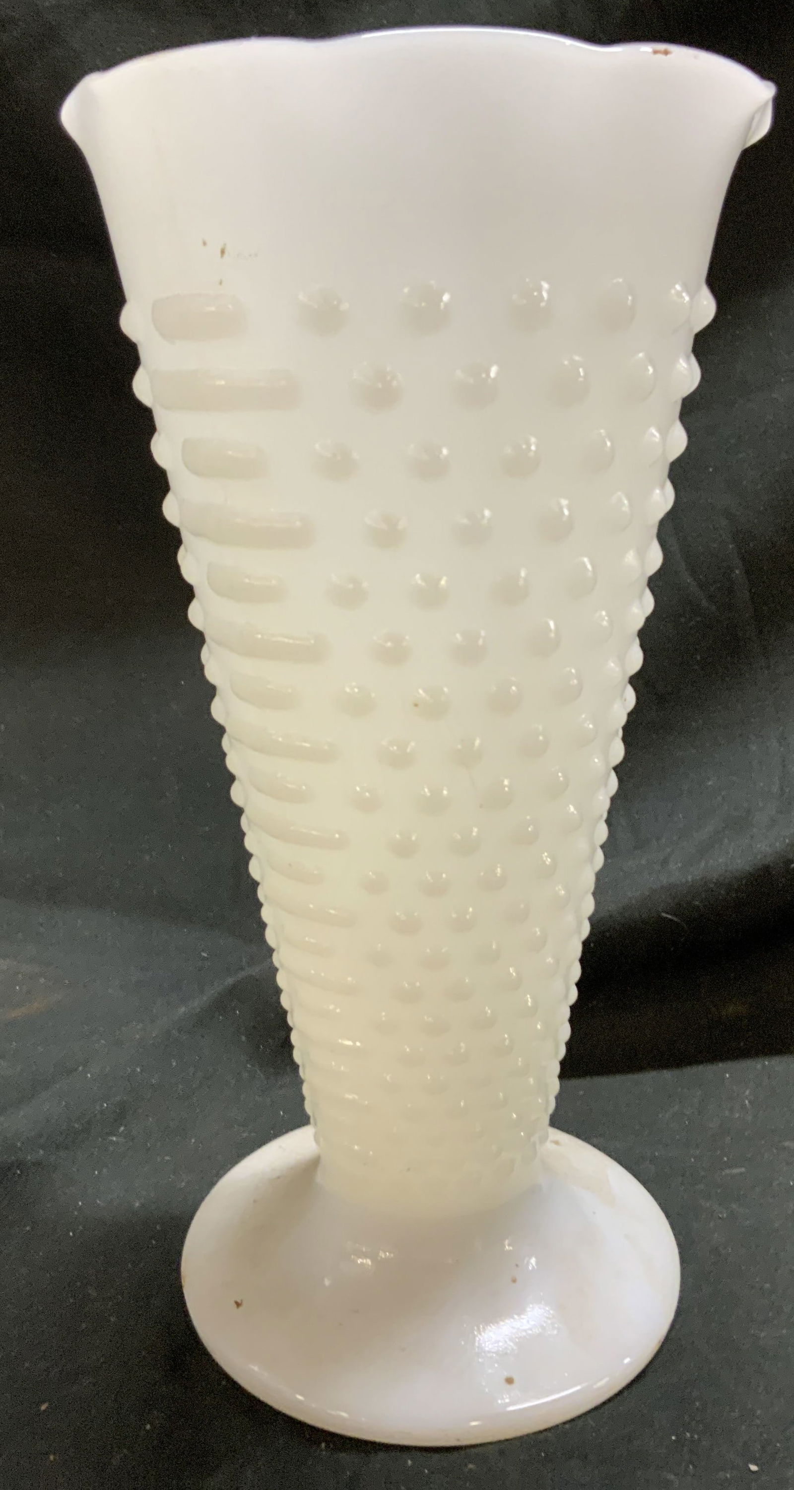 Anchor Hocking Vtg White Milk Gls Hobnail Vase: Vase is footed. Piece appears to be ANCHOR HOCKING (No apparent markings). Vase is white toned milk glass with hobnail beveled pattern detail. Vase has floral style rim. Vessel measures approximately