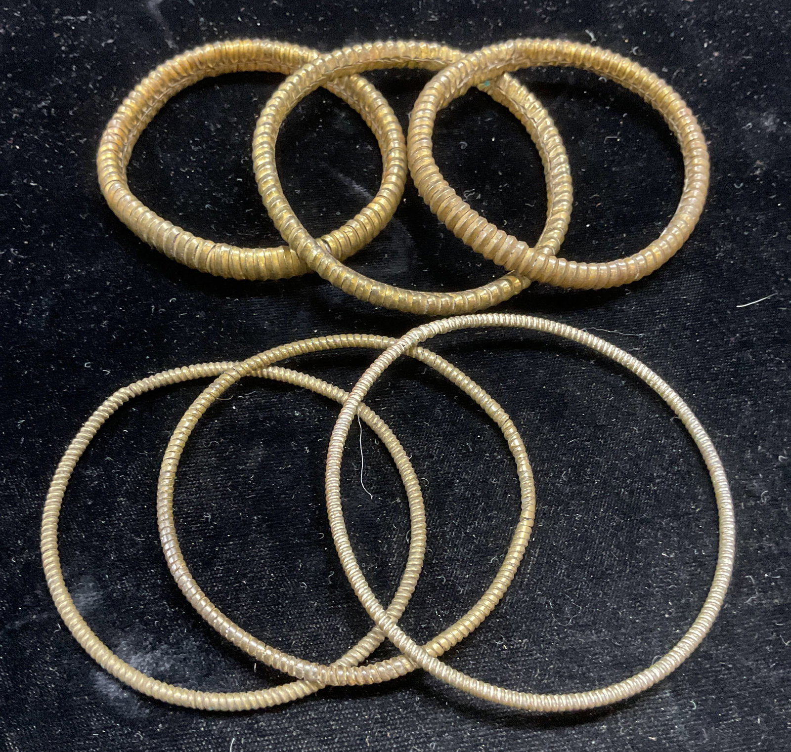 Lot 5 Vintage Gold Tone Bangle Bracelets: Lot of 6 Vintage gold tone textured band bangle bracelets. Sizes vary, largest approx 3 inches wide. Some wear including scratching. Jewelry, estate jewelry, costume jewelry, cocktail jewelry, fashion