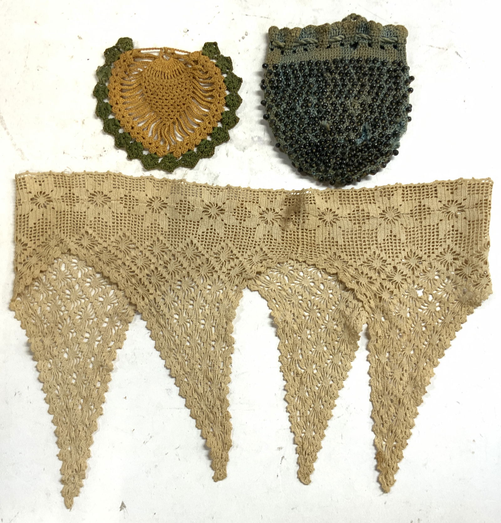 Lot 3 Vtg Lace Trim Edging Doily & Beaded Sack: Lot includes 1 tan toned lace edging, 1 goldenrod & green toned lace doily & 1 hand woven light blue bag with black toned beaded detail. Lace edging measures approximately 16.5 inches long 10 inches d