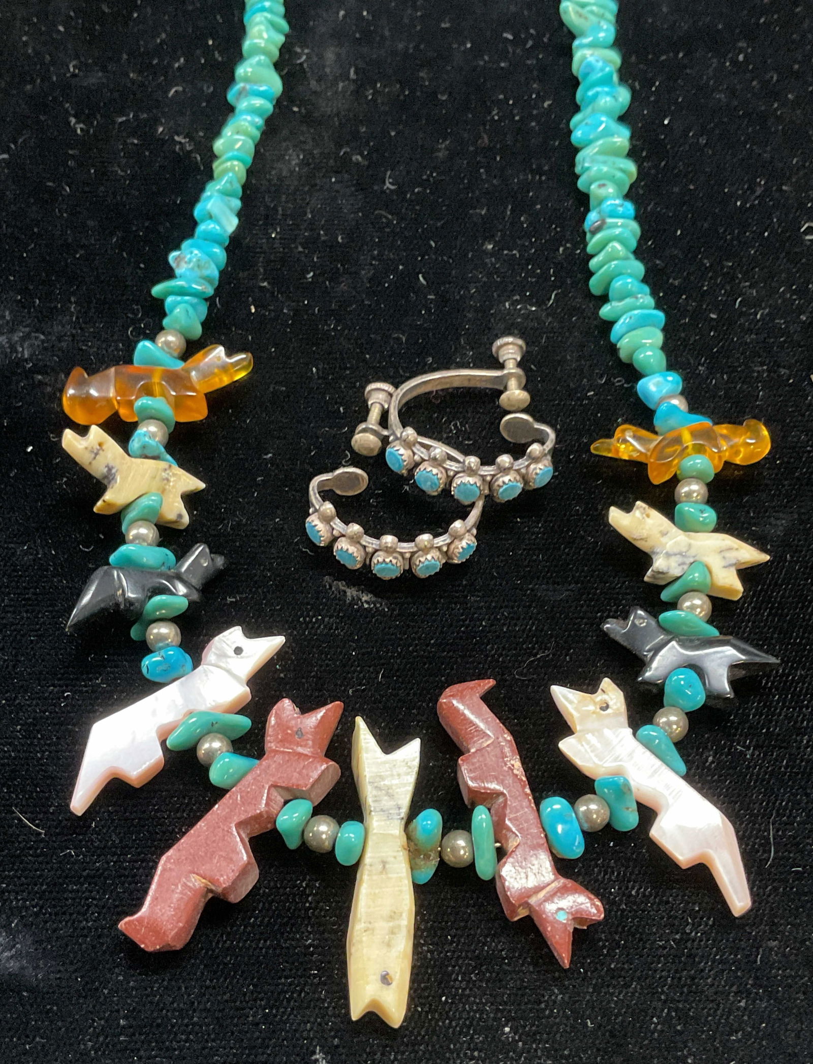 Lot 2 Sterling Silver Turquoise Animal Necklace +: Lot of 2 sterling silver and turquoise earrings and necklace. Necklace with sterling silver accents, turquoise beads and carved semiprecious and shell animal motif pendants. Marked sterling. Sterling