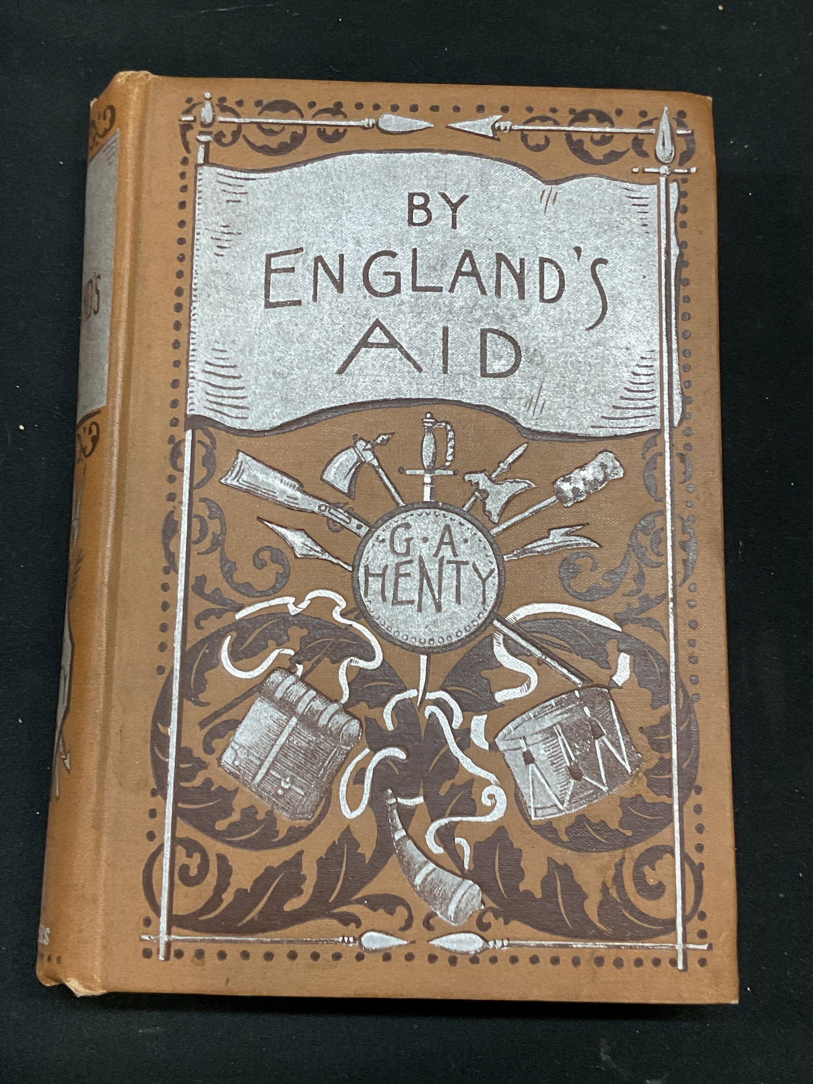 Antq By Englands Aid G. A. Henty 1894 Illustr: Antique hardcover copy of By England Aid of The Freeing of the Netherlands by G. A. Henty. Illustrated. Charles Scribners Sons, 1894, first published 1890. Measures approx 7.25 x 5 inches. Some wear t
