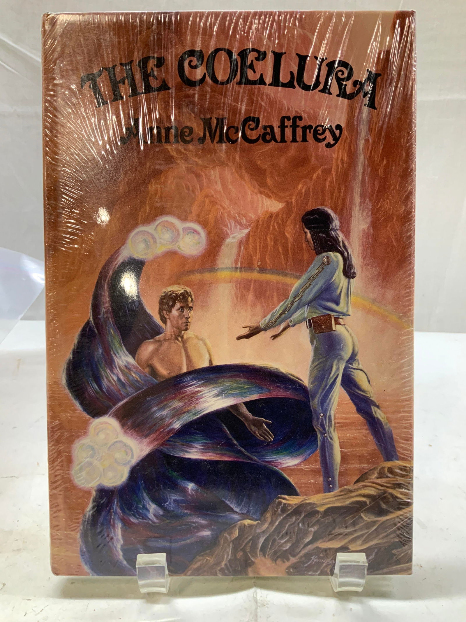 1983 The Coelura Science Fiction Book NIP MCCAFREY: 1983 The Coelura Science Fiction Book NIP MCCAFFREY The Coelura book by Anne McCaffrey. Front cover of book features illustrations of two figures. NEW IN PLASTIC. Book appears to have been published i