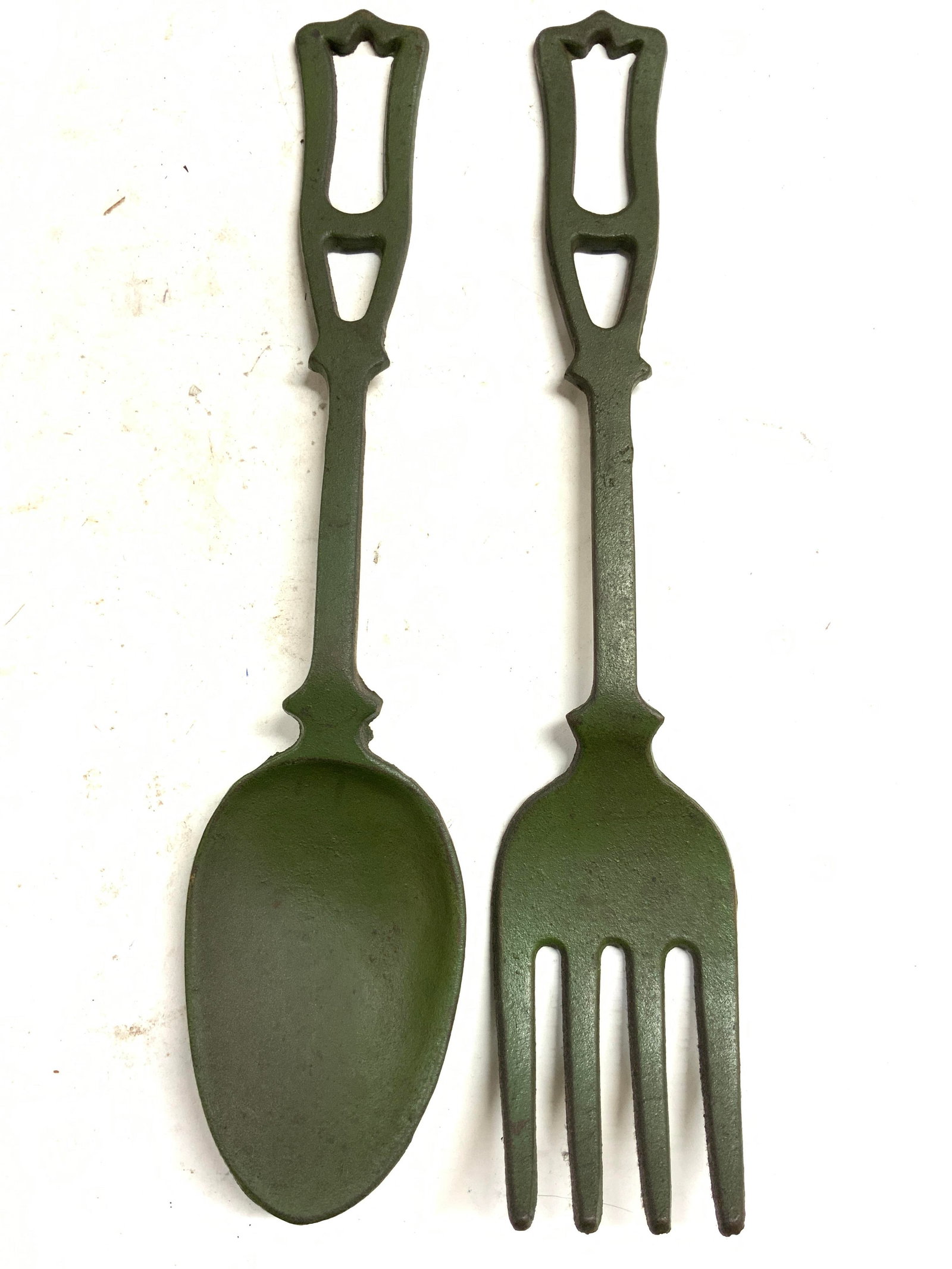 Pr APCO Vntg Iron Spoon & Fork Wall Decor Jpn 20in: Tag on backside of spoon reads APCO, bottom portion illegible, possible origin Japan. Lot includes 1 salad serving spoon wall hanging and 1 salad serving fork wall hanging. Each piece is green toned a