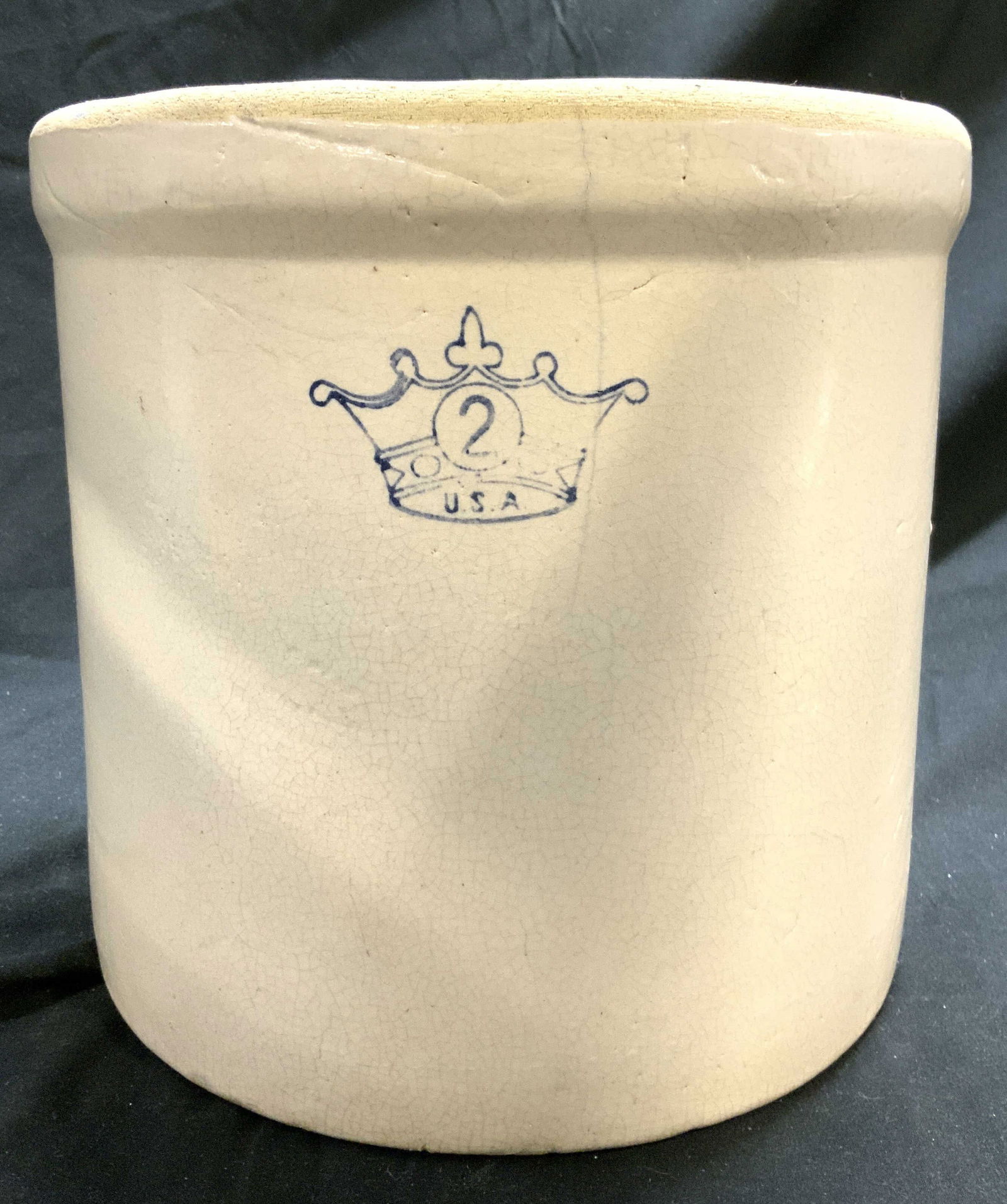 Robinson Ransbottom Blue Crown Stoneware Crock: Crock appears to be ROBINSON RANSBOTTOM. Underside and crown trademark reads USA. Crock is ceramic stoneware. Piece has and toned exterior, brown toned interior. Crock is 2 gallon size as read on mark