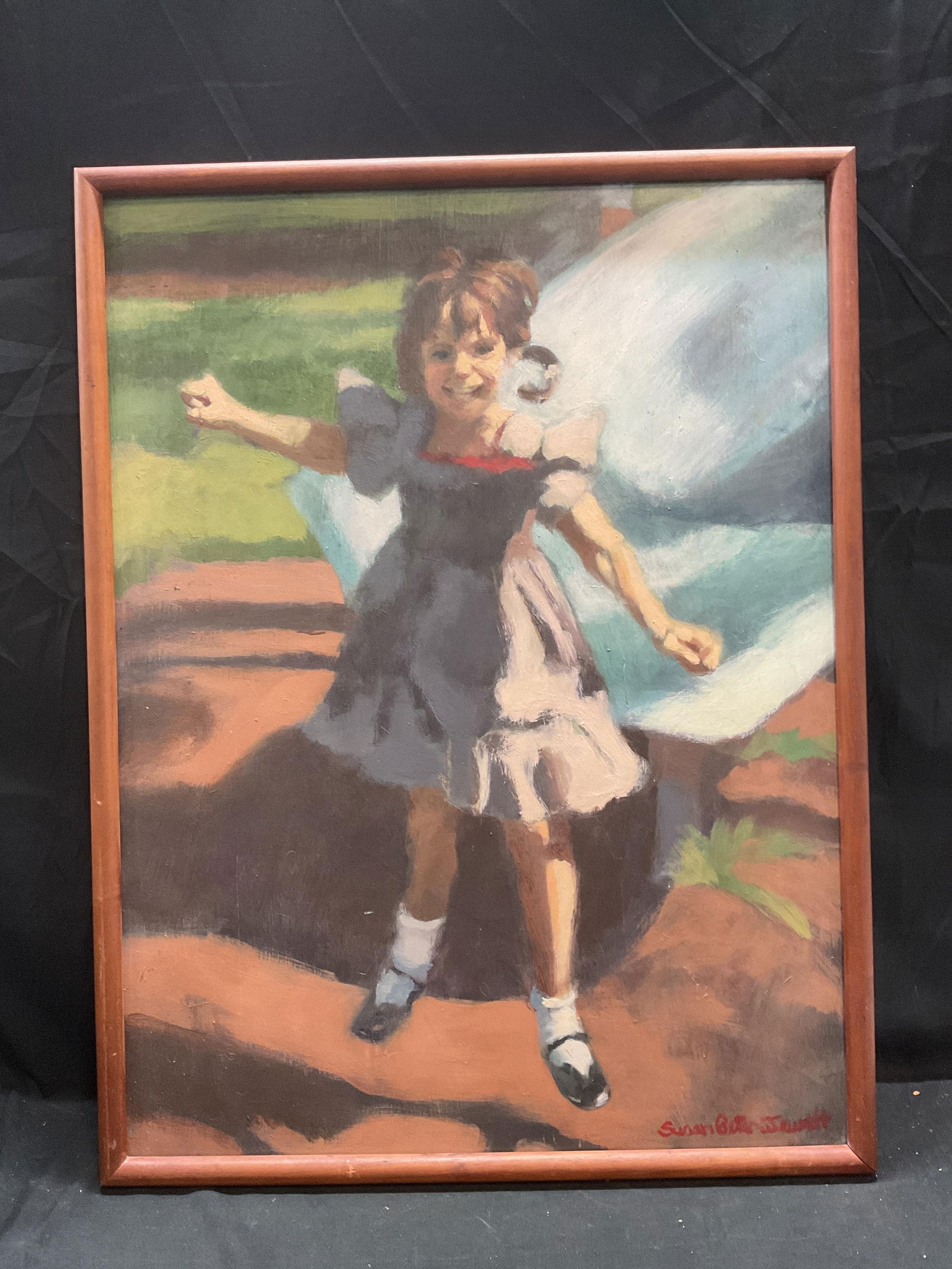 Signed Susan Jewett Portrait of Girl Oil Painting: Framed oil on masonite painting. Signed at lower right, partially legible, Susan B Jewett. Portrait of a girl wearing dress in pink, blue, and brown. Wood frame. Not examined out of frame. Frame measu