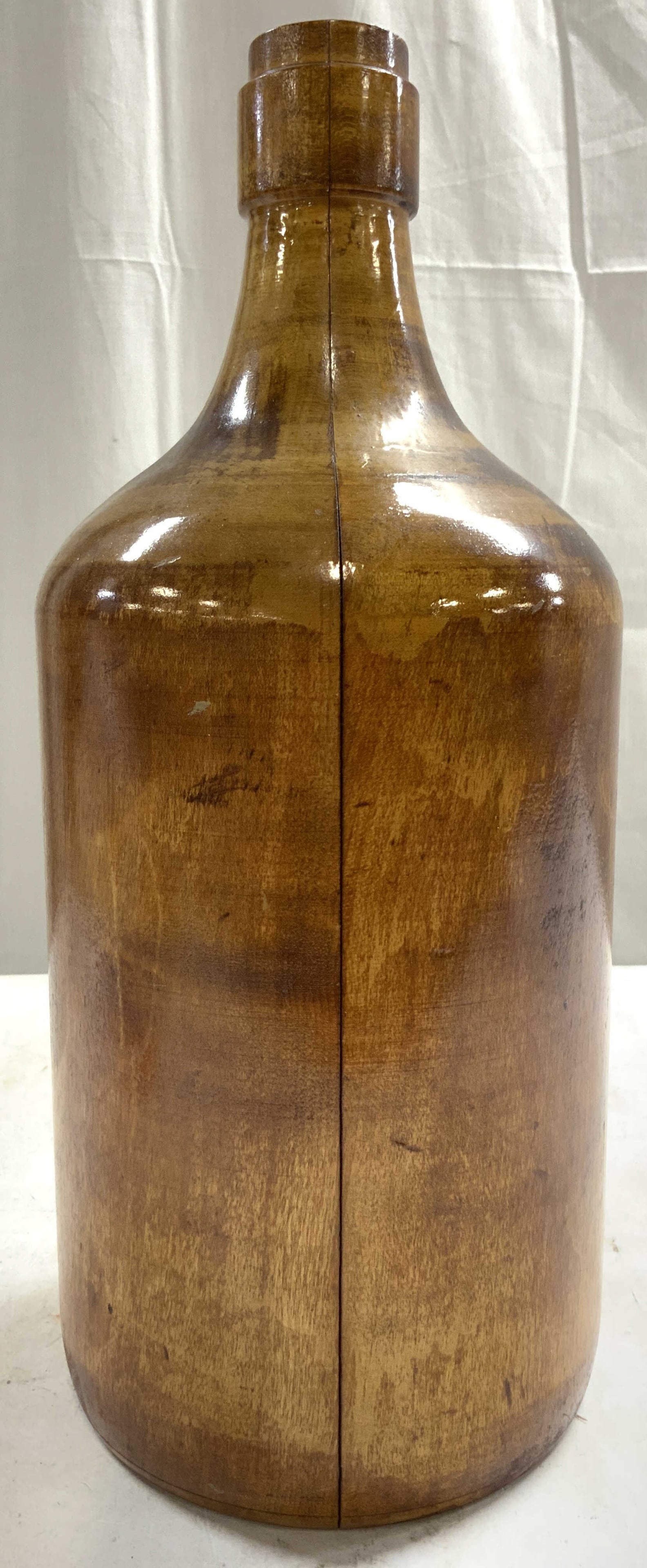 Vintage Carved Wooden Bottle Jug Mold Form 14in: Bottle mold is tan toned and wooden. Piece appears to be vintage. Possibly antique. Top of piece is inscribed 6 8-8. Underside is inscribed 152 750. Bottle mold is significantly weighted for size. Pie