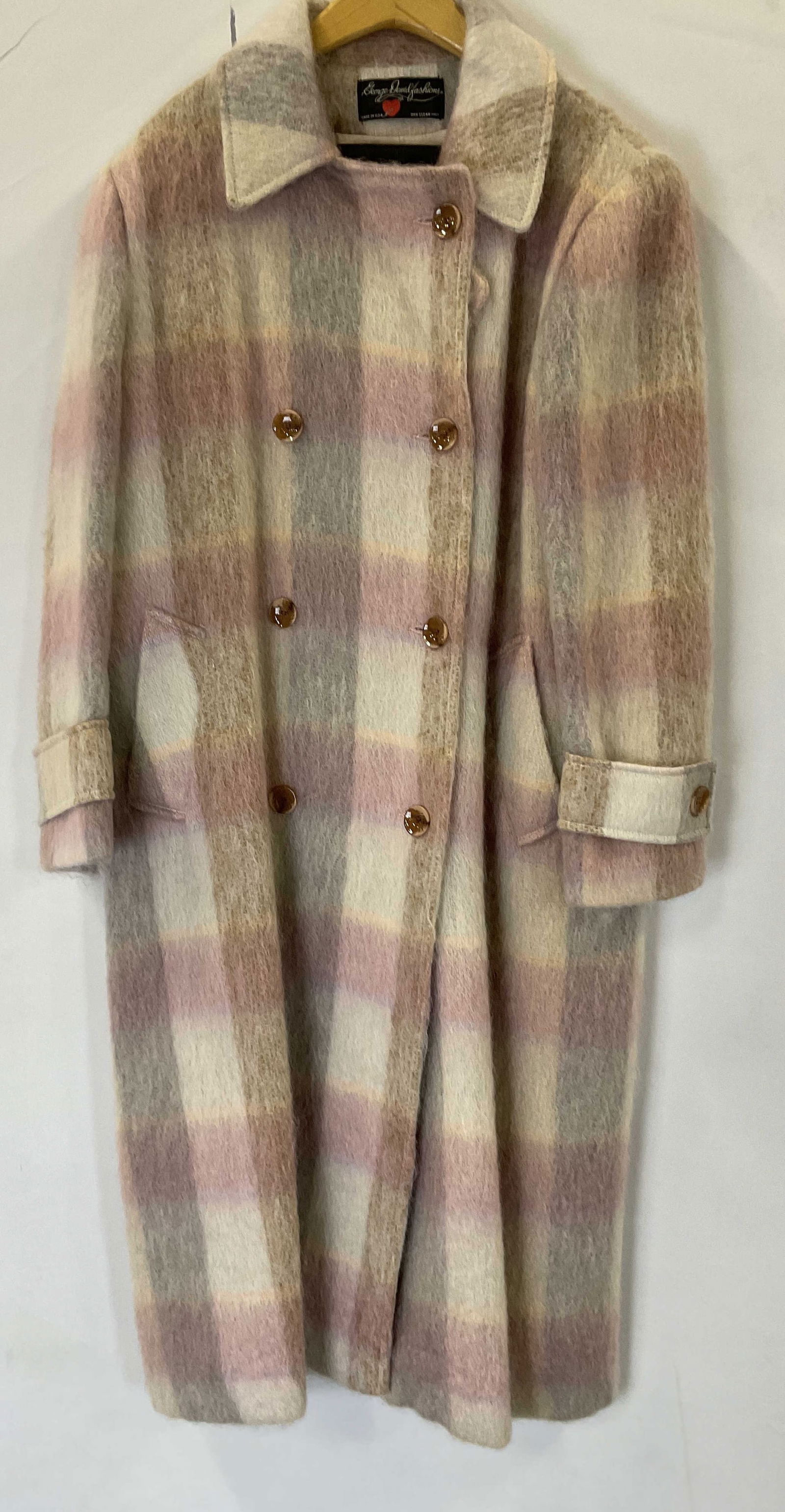 GEORGE DAVID FASHIONS USA Vintage Pink Plaid Coat: GEORGE DAVID FASHIONS USA Vintage Pink Plaid Coat. Brand tag reads GEORGE DAVID FASHIONS Made in USA. Tag towards base reads Ladies Garment Workers Union, Made in USA. Button closure. Crafted from a m