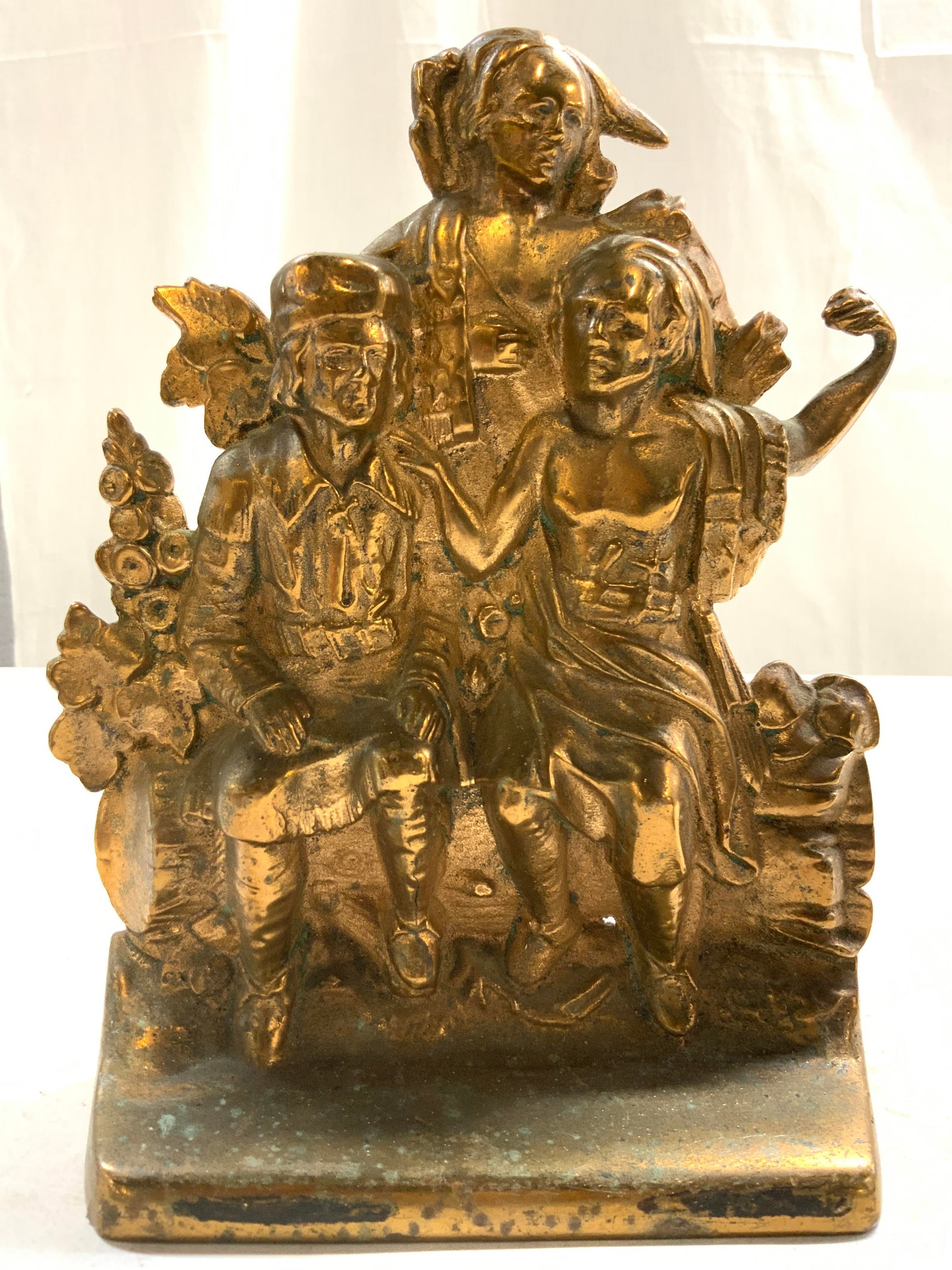 Last of the Mohicans Figural Brass Bookends: Brass bookends. LAST OF THE MOHICANS. The figures presented are Natty Bumppo, Chingachgook and Uncas from James Fenimore Coopers Leatherstocking Tales. Lot includes 2 bookends, each are gold toned and