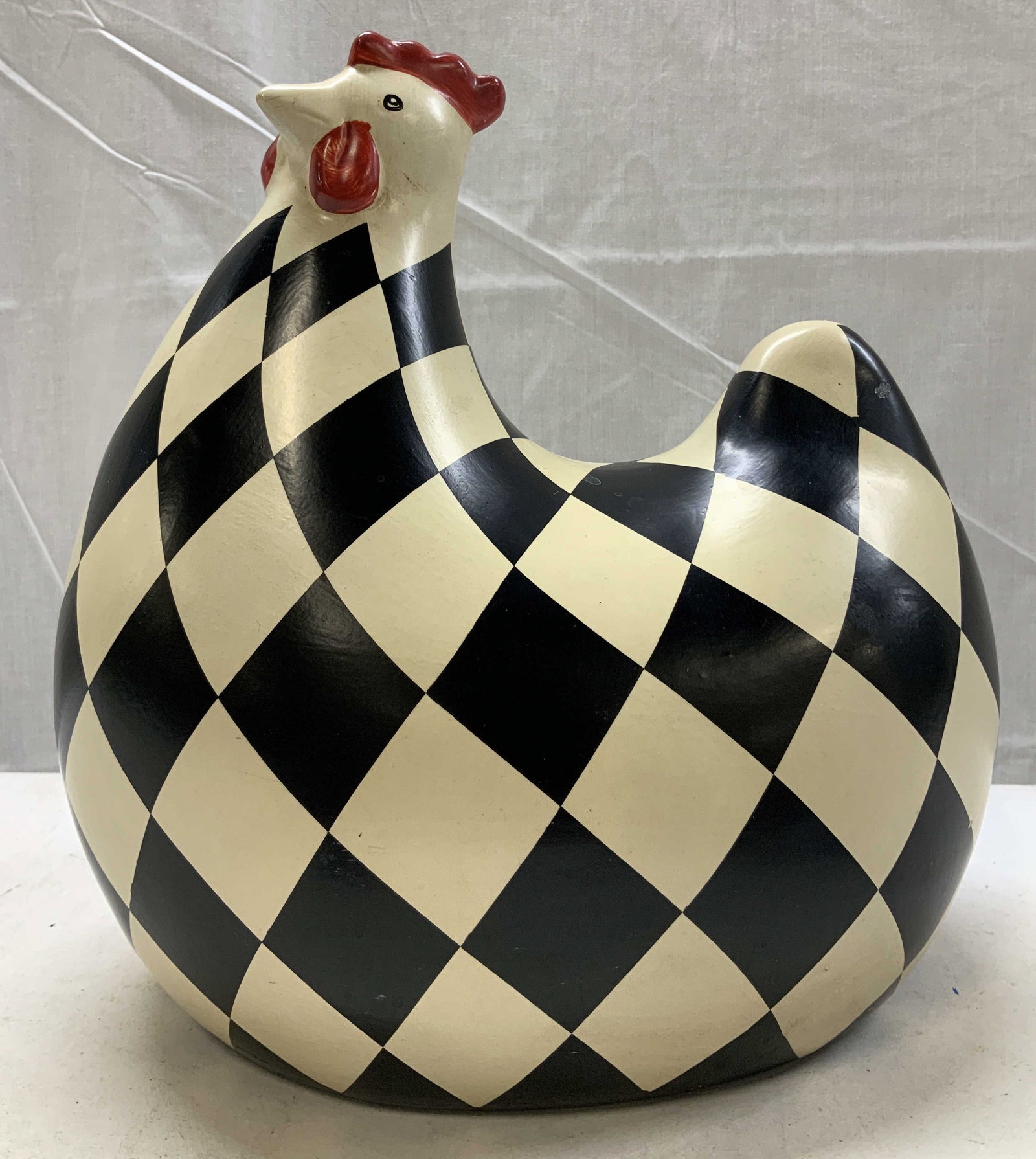 Vntg Folk Art Enamel Metal Checkered Chicken: Vntg Folk Art Enamel Metal Checkered Chicken Chicken sculpture features a distinctive black & white checkered pattern. Chicken appears to be enamel metal material. Surface wear consistent to age, use 