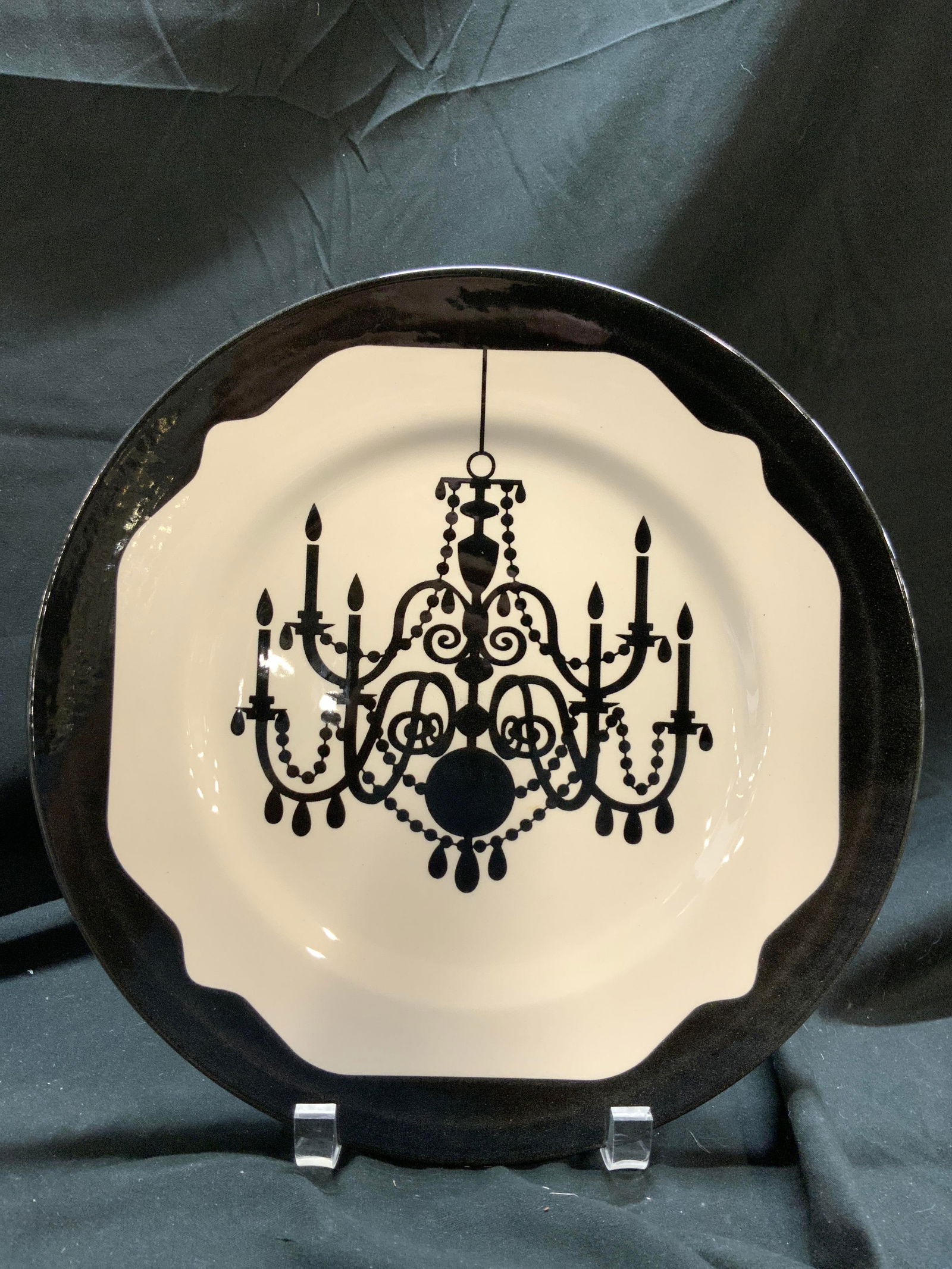 ANDREW TANNER Pr Porcelain Chandelier Plates Eng: Undersides are marked ANDREW TANNER MADE IN ENGLAND. Lot includes 2 plates. Each are porcelain. Plates each are cream with black toned chandelier detail and edges. Plates each measure approximately 11
