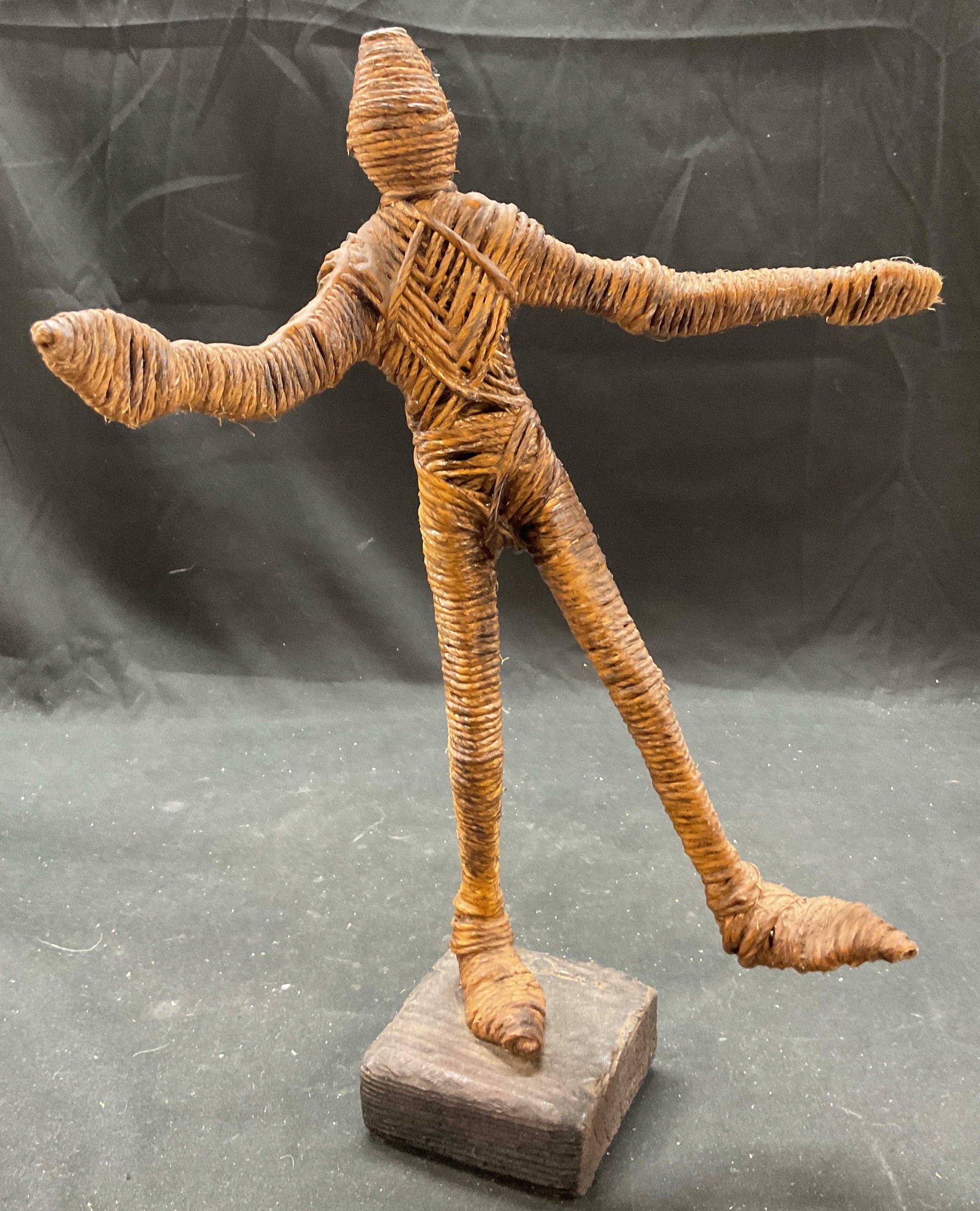 Vtg Wood Straw Mummy Standing Figurine, 15 in.: Vintage wood straw mummy sculpture standing figurine. Sculpture of a human like figure crafted from braided or woven natural fiber, likely straw of raffia. Mounted on wooden base. Measures 15 x 11.25