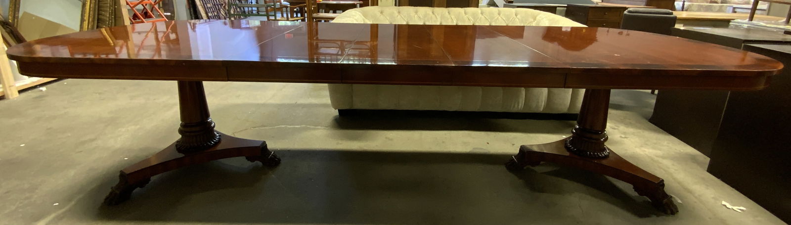 WINTERTHUR Dbl Ped Mahogany Dining Tbl W Leaves: Underside reads WINTERTHUR 17 19 275. Mahogany Double pedestaled Contemporary banded extension table. Piece has metal table runners ending on carved bolsters pedestals ending on stepped triangular woo