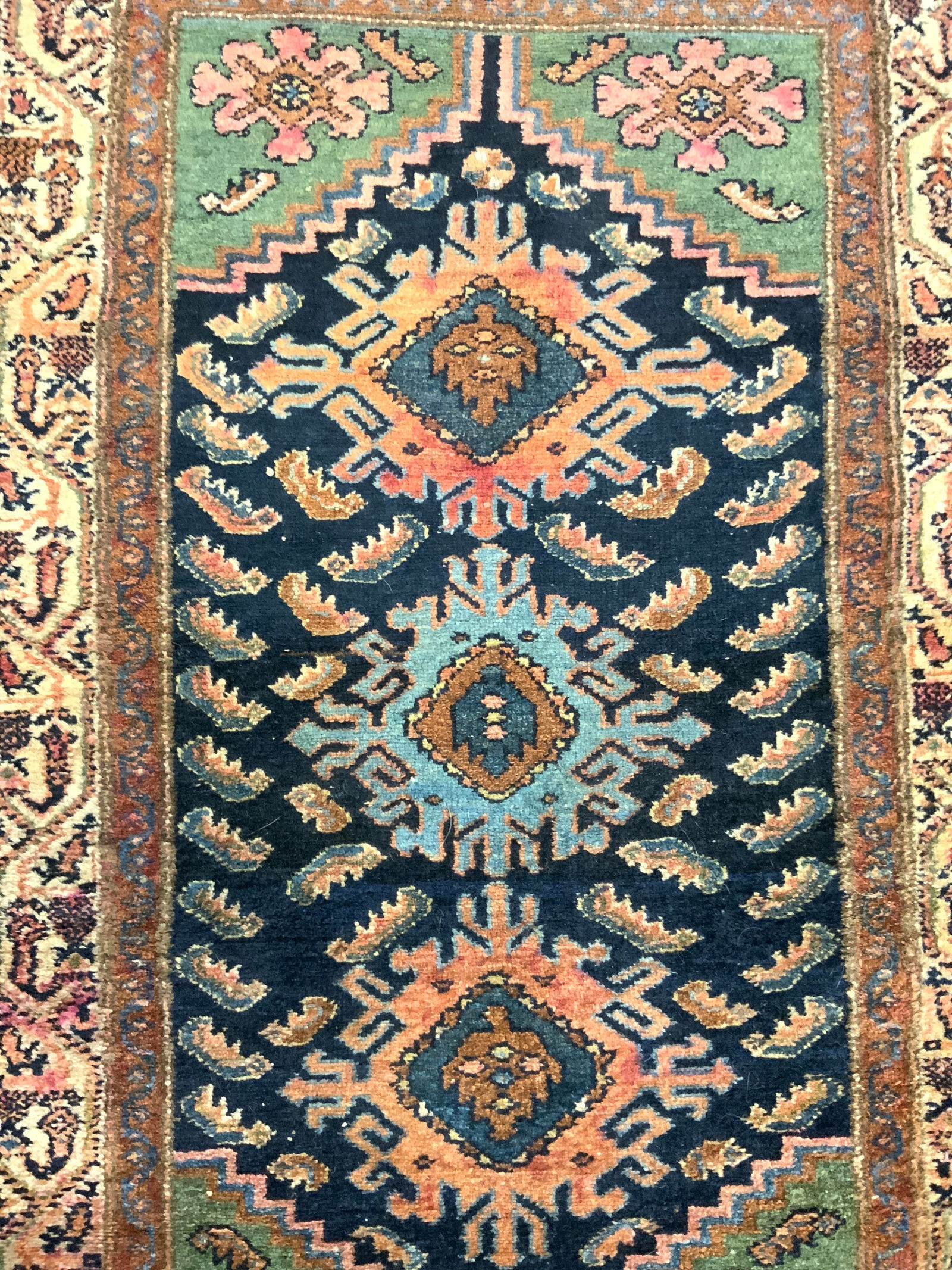 Vintage Handmade Persian Wool Rug: Rug is handmade and wool. Piece is vintage and Persian. Rug has intricate multi toned floral and geometric detailing. Rug measures approximately 49 inches long 32 inches wide. Rug, handmade rug, Persi