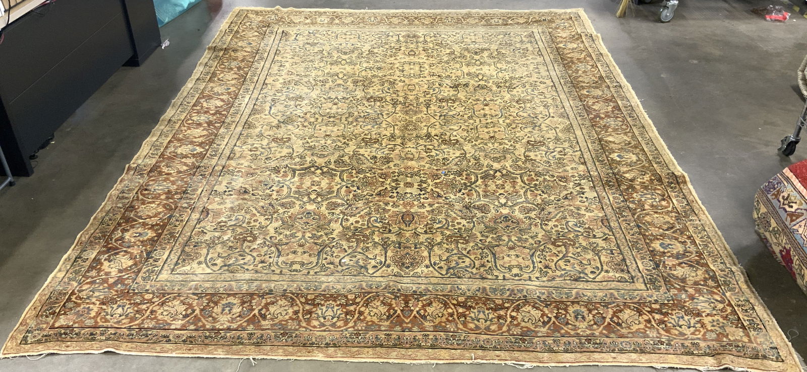 Antique Handmade Persian Wool Area Rug: Rug is handmade and wool. Appears to be antique possibly vintage. Rug has intricate multi toned floral motif detailing. Rug appears to be Persian. Measures approximately 138 inches long 106 inches wid