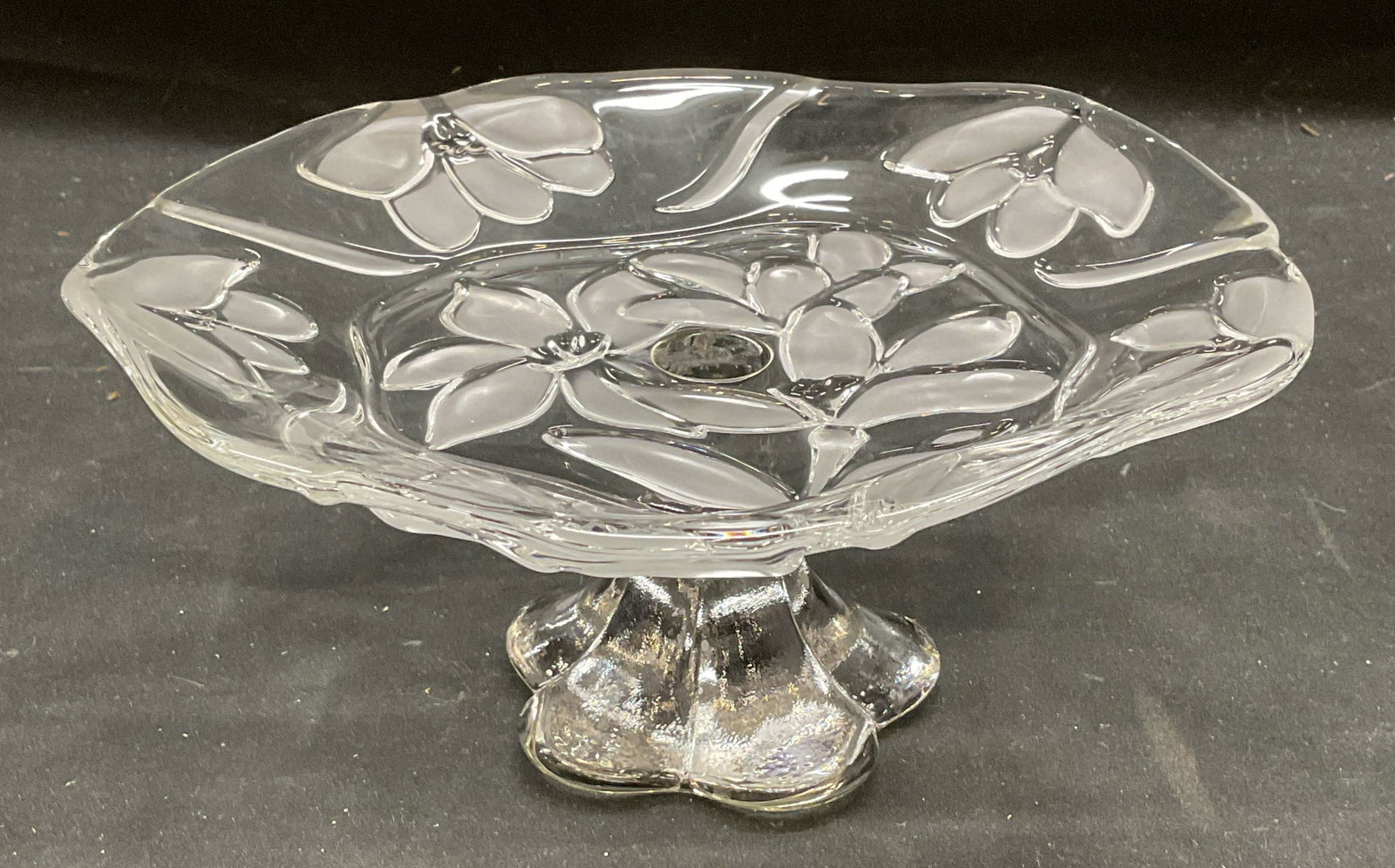 Frosted Floral Motif Pedestal Bowl: Clear glass pedestal bowl with frosted floral motif. Scalloped base and organic shaped rim. Measures approx 8 x 4 inches. Piece has weight. Some scratching. Pedestals bowl, floral bowl, footed bowl, g