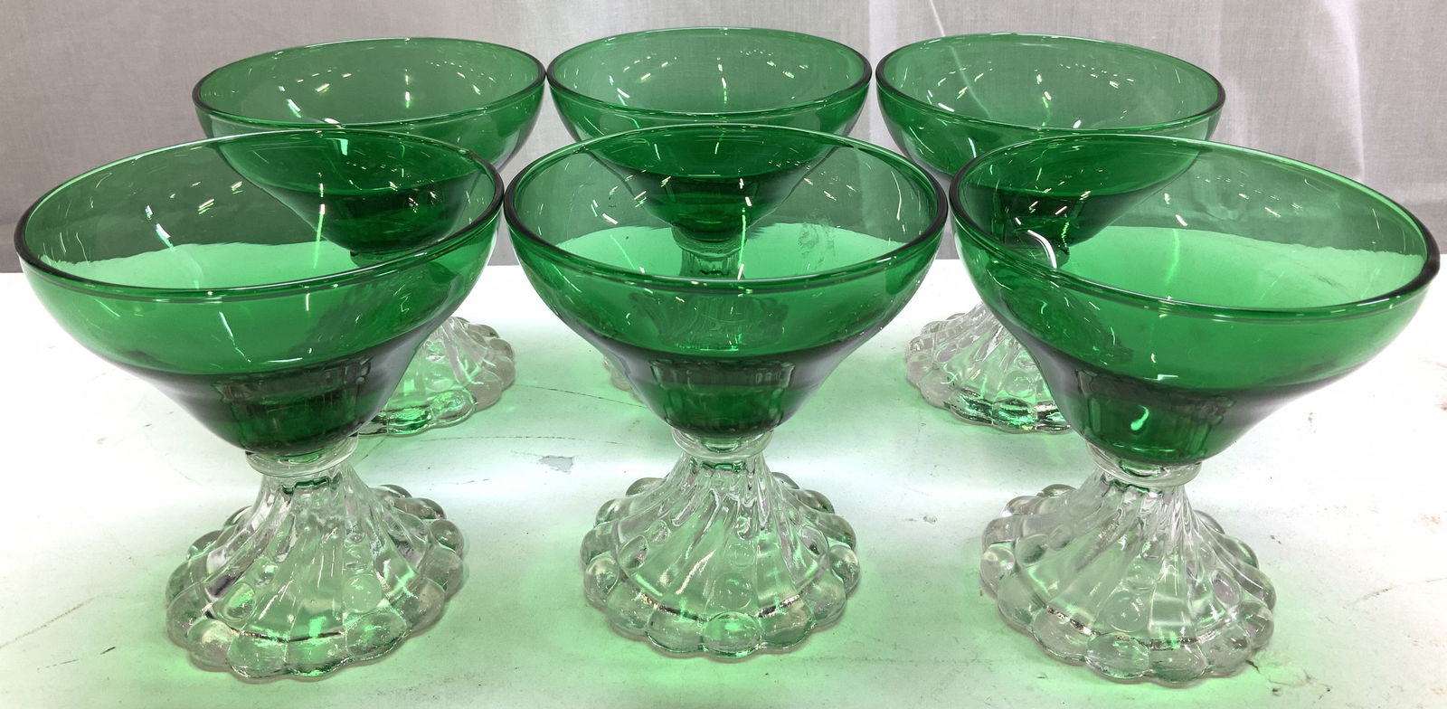 Lot 6 Vntg Forest Green Burple Sherbet Glasses: Lot 6 Vntg Forest Green Burple Sherbet Glasses. Anchor Hocking style, mid century modern style, no apparent hallmarks. Sherbet glasses feature a distinctive forest green glass color & a clear/swirled