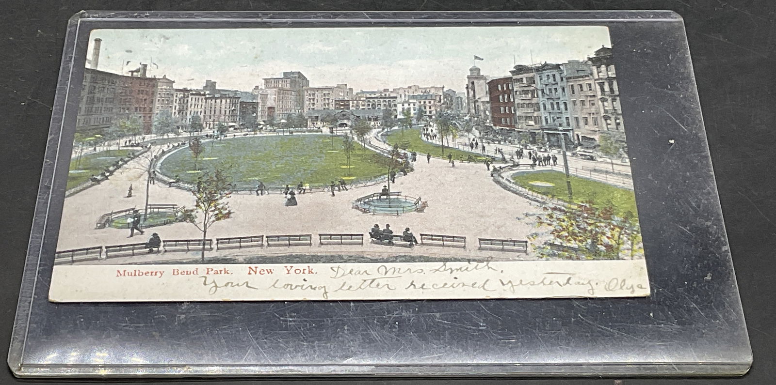 1907 Mulberry Bend Park NY Postcard, Ephemera: 1907 Mulberry Bend Park NY Postcard. Obverse reads Mulberry Bend Park, New York. Writing to the obverse. Ink stamp to reverse is worn, appears to read AUG 21 1907. Writing to reverse. Green one cent s