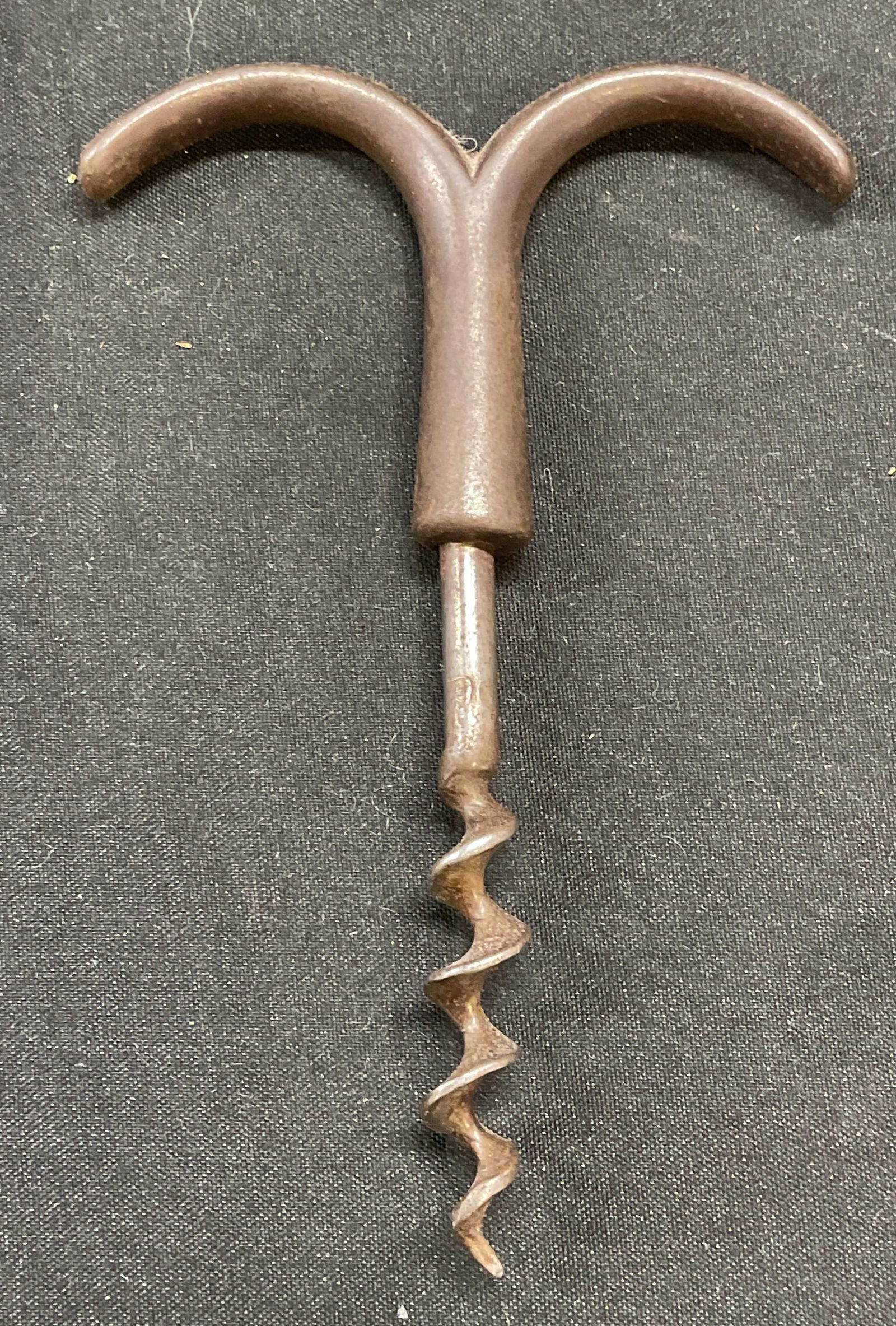 Antique Metal Corkscrew Bottle Opener: Antique metal corkscrew bottle opener. Measures approx 4.5 x 3 inches. Wear including patina. Corkscrew, bottle opener, antique bottle opener, kitchenware, kitchen accessories, homewares, home accesso