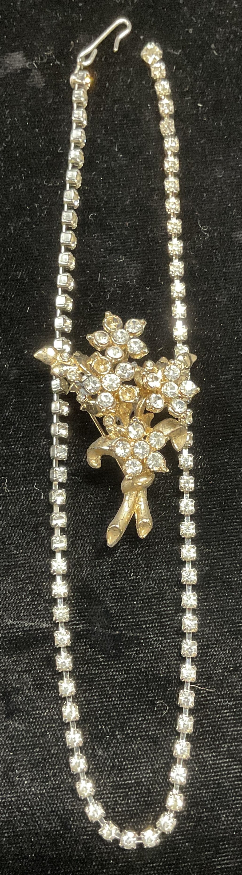 Lot 2 Vtg Crystal Necklace, Flower Brooch: Lot of 2 pieces. Vintage silver tone crystal necklace and gold tone crystal flower motif brooch. Necklace drop length approx 7 inches. Brooch approx 2 x 1.5 inches. Some crystals need replacement. Som