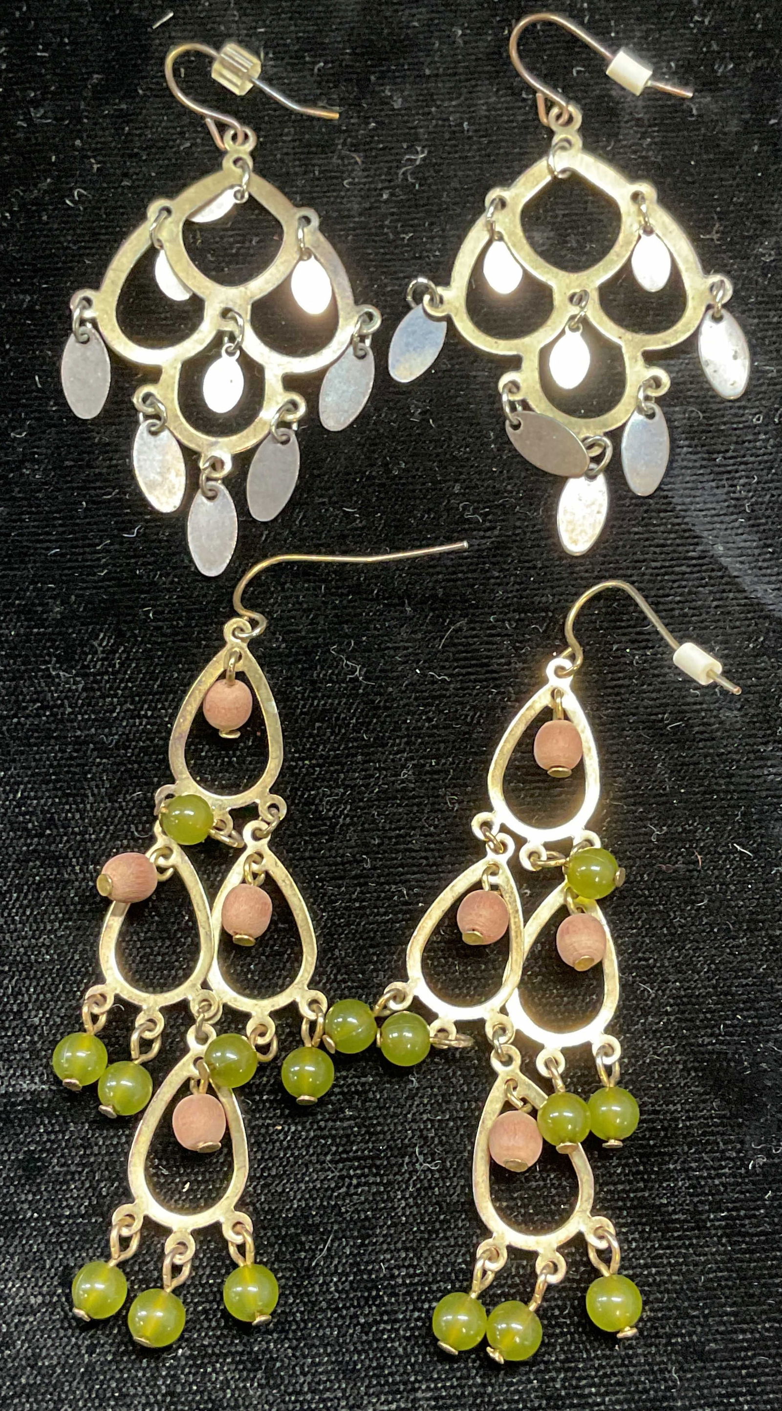 2 Pairs Vintage Gold Tone Chandelier Earrings: Lot of 2 pieces. Vintage gold tone chandelier earrings. One pair with green and wood beads. Larger measure approx 2.5 inches long. Some scratching observed. Jewelry, estate jewelry, costume jewelry, c