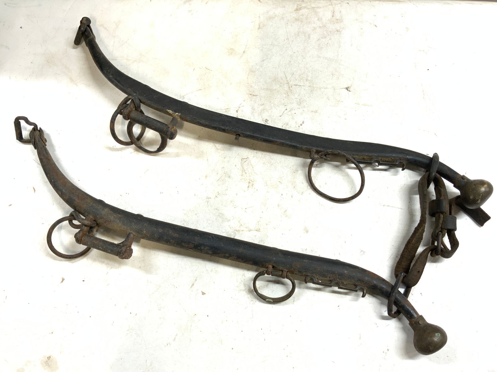 Vintage Pr Of Wrought Iron Horse Hames: Horse hames appear to be vintage possibly antique. Each piece is wrought iron. Horse hames are held together by leather strap. horse hames Measure approximately 28 inches long. Horse hames, vintage ho