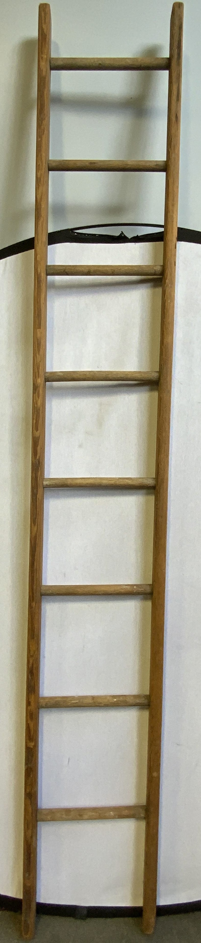 Vintage Tan Toned Wooden Ladder 8.5ft: Ladder is tan toned and wooden. Piece appears to be vintage. Measures approximately 102 inches tall 15.5 inches wide. Ladder, wooden ladder, vintage ladder, vintage wooden ladder, tan ladder, tan wood