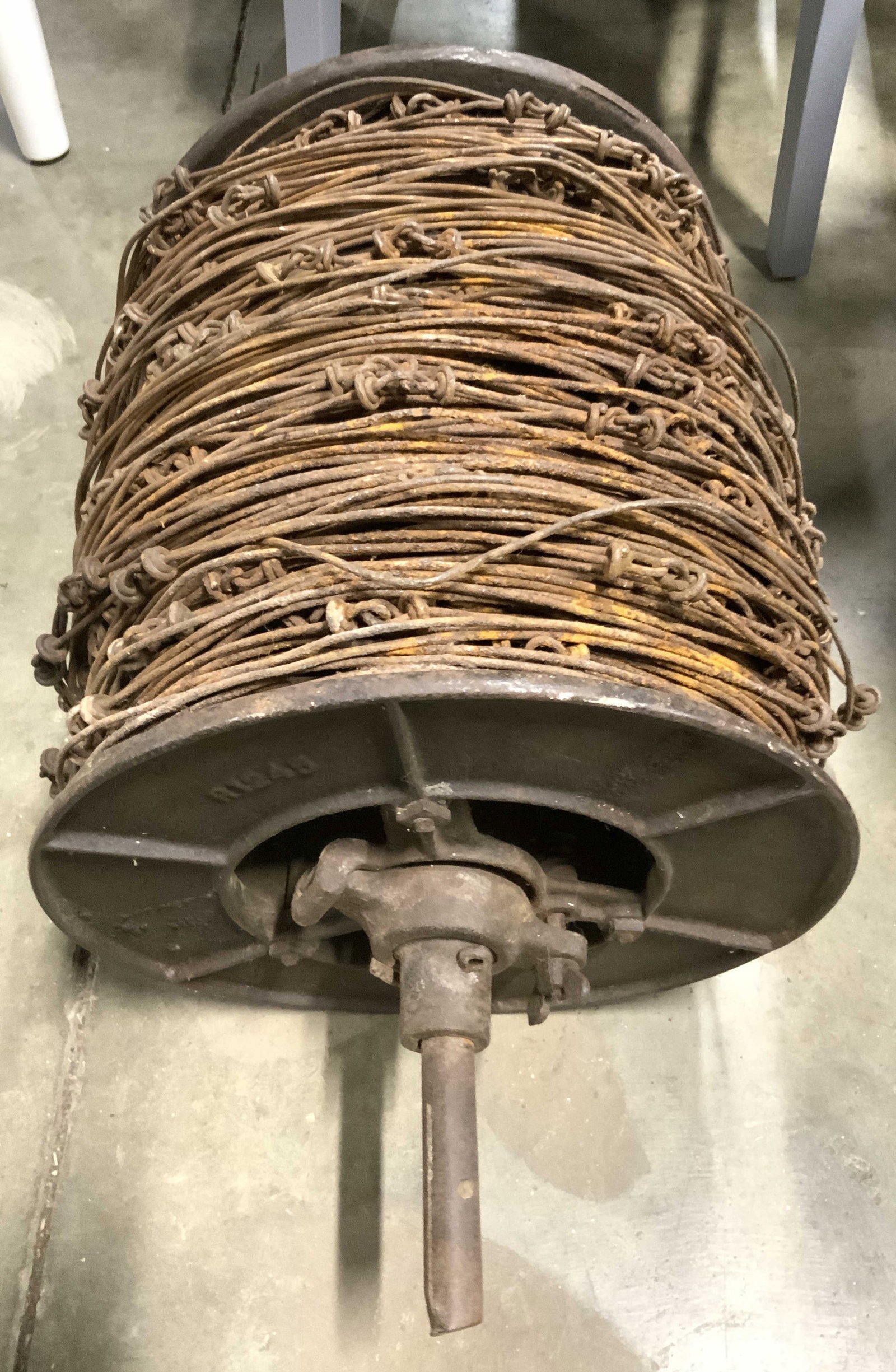 WW2 Vintage German Spool Of Check Wire: Spool of check wire is vintage. Side reads R1245. Circa World War Two. Spool appears to be iron. Piece is significantly weighted. Measures approximately 26 inches wide 13 inches deep. Check wire, spoo