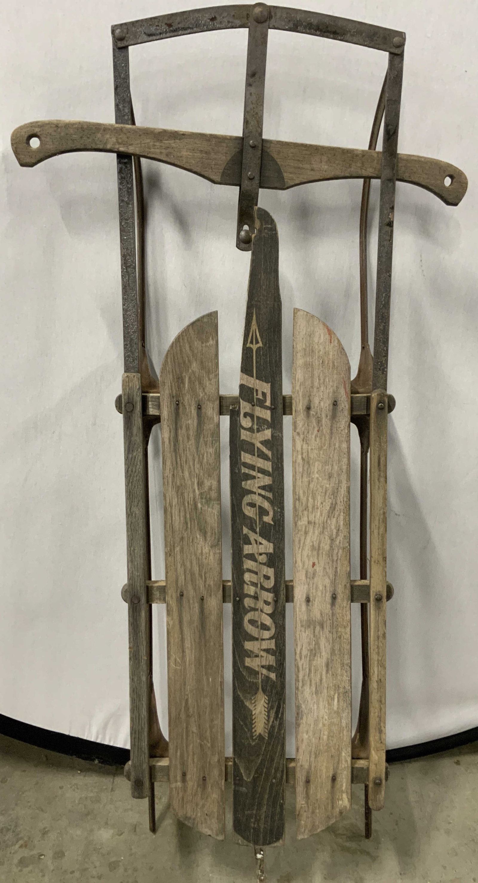 FLYING ARROW Vtg Wood & Metal Snow Sled 46in: Snow sled is vintage. Piece is marked FLYING ARROW in white lettering. Snow sled is wooden & metal. Measures approximately 46 inches long 22 inches wide 7 inches tall. Sled, snow sled, vintage sled, v