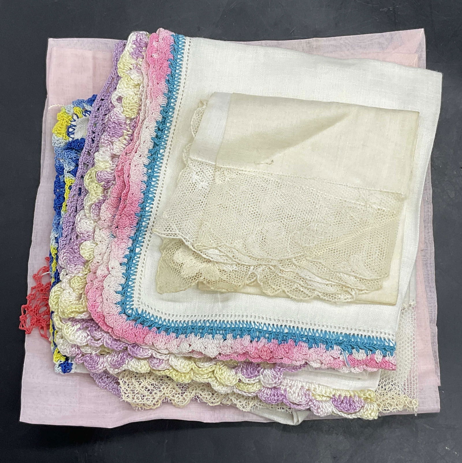 Lot 8 Vintage Embroidery Handkerchiefs & Napkins: Lot of Eight Vintage Lace & Embroidery Handkerchiefs and Fabric Napkins. Crafted from soft hand fabric. Pieces feature pink, blue, cream, white, and other colors. Blue and pink trimmed hankie measures