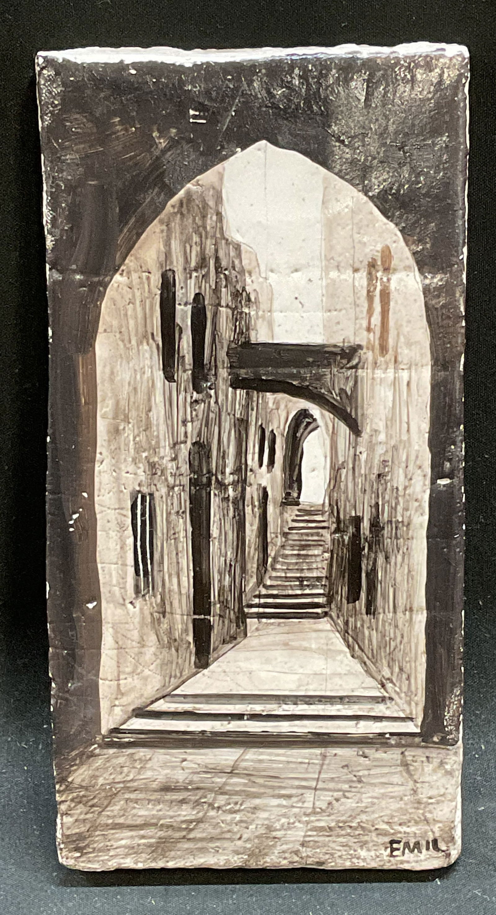 Signed Emil European Scene Painted Tile: Hand painted plaster tile. Signed Emil at lower right. European street scene with archway, stairs, and buildings. Measures approx 6 x 3 inches. Some scratching and chipping. Art, fine art, painted til