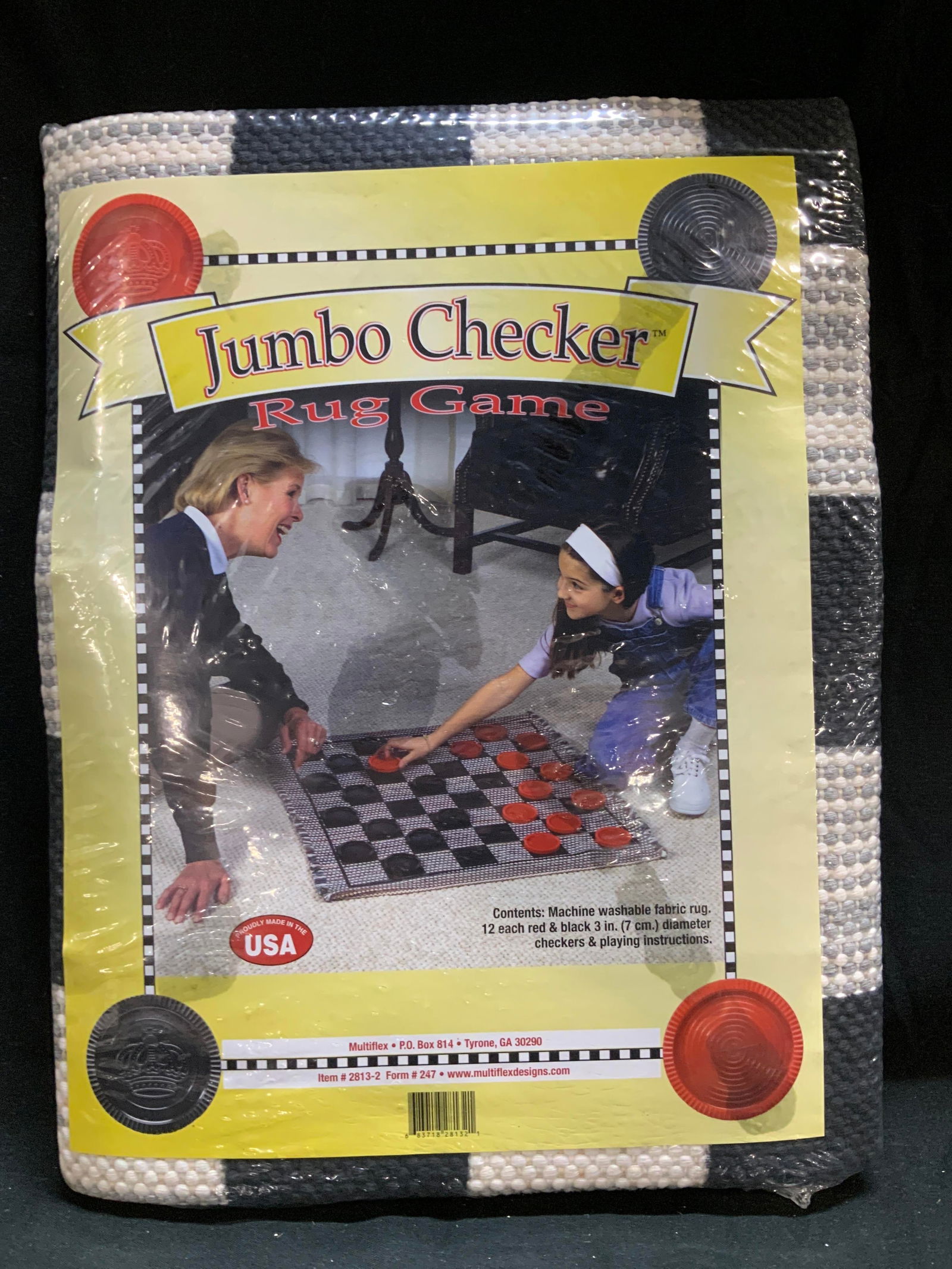 MULTIFLEX Jumbo Checker Rug Game NIP: MULTIFLEX Jumbo Checker Rug Game NIP New in plastic, featuring a fabric rug with red & black checkers. Surface wear consistent to age, use & exposure. Measurements in plastic: length 12.5in x width 9.