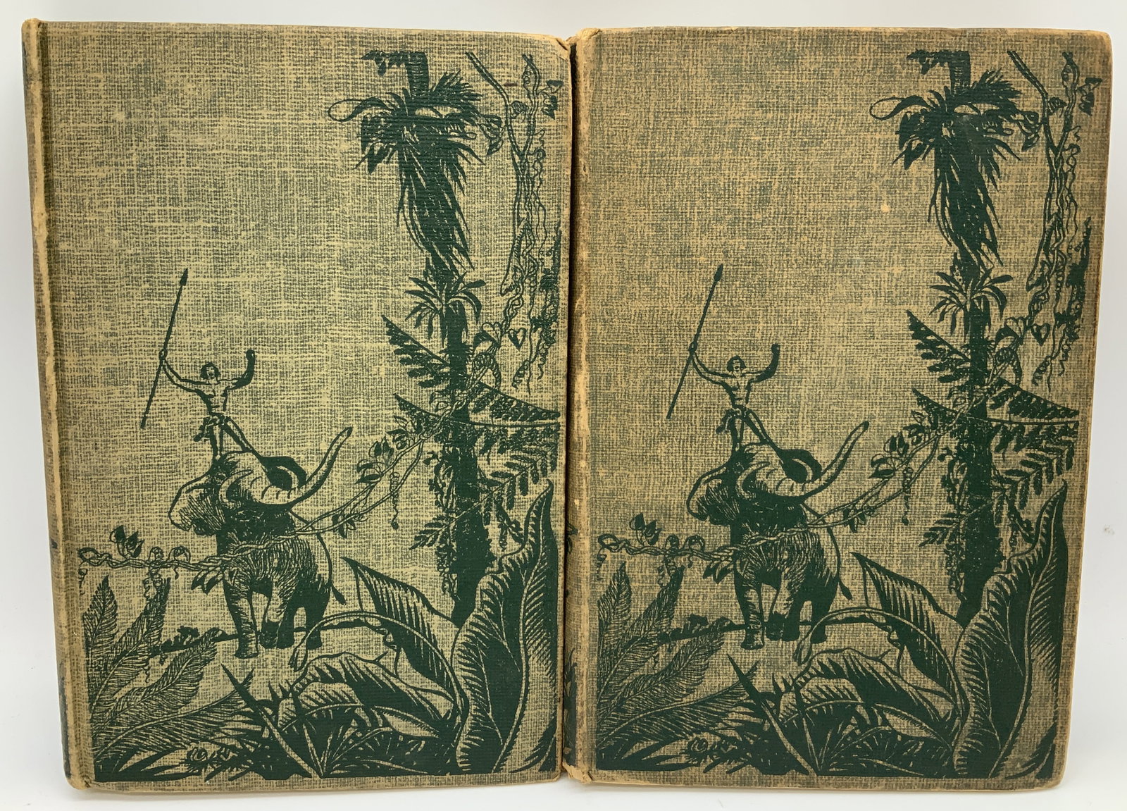 Lot 2 Vntg Tarzan Books 1920s Burroughs: Lot includes, Tarzan & the Ant Men (1924). Copyrighted in Great Britain. Tarzan The Terrible (1921). Copyrighted in Great Britain. Books by Edgar Rice Burroughs. GROSSET & DUNLAP. PUBLISHERS NEW YORK.