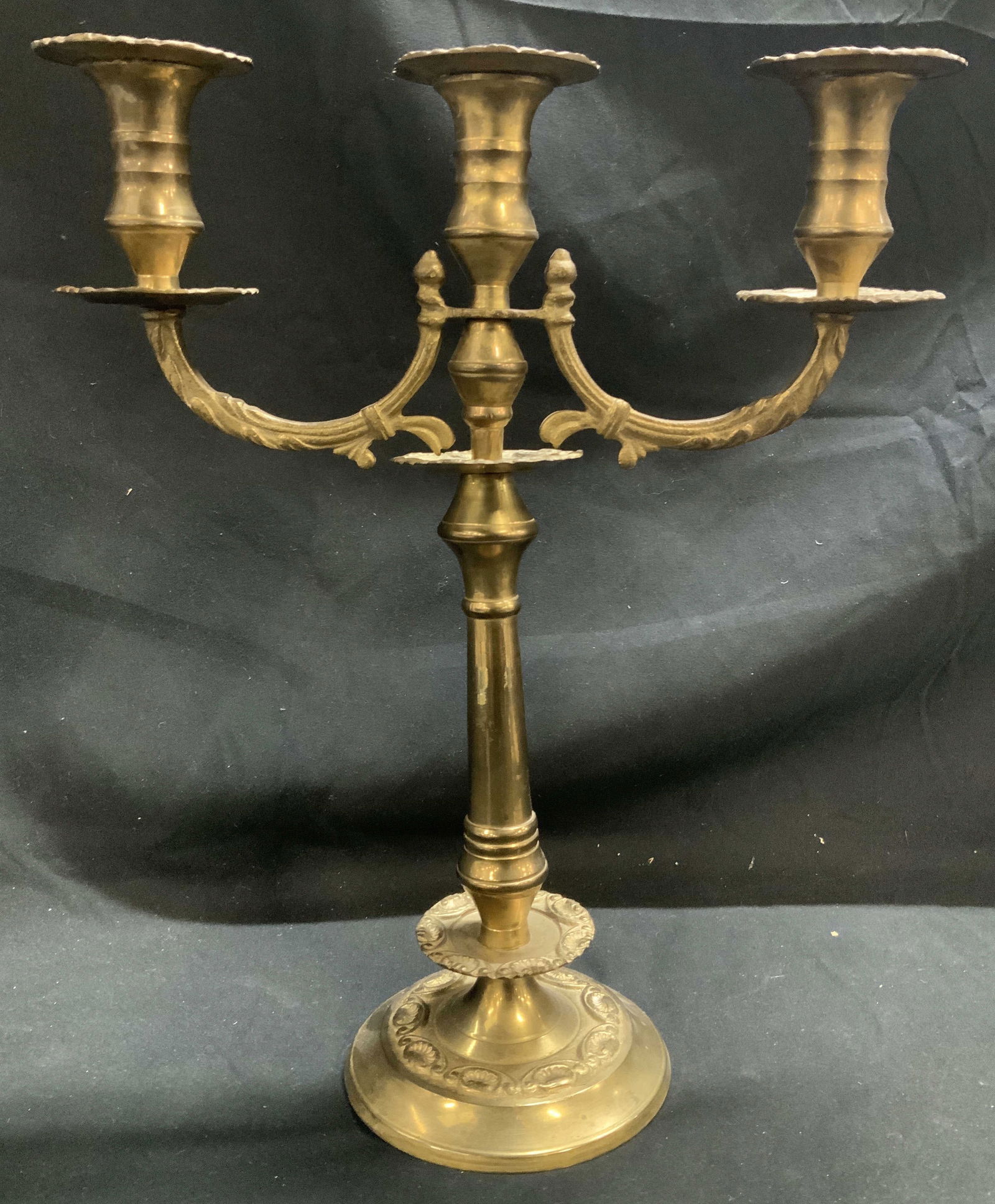 Vntg 3 Arm Brass Scrollwork Candelabra INDIA: Candelabra is made of brass material & features a central stem with three arms extending outwards. Arms feature scrollwork detailing. Marked on underside. Reads, MADE IN INDIA. Surface wear consistent
