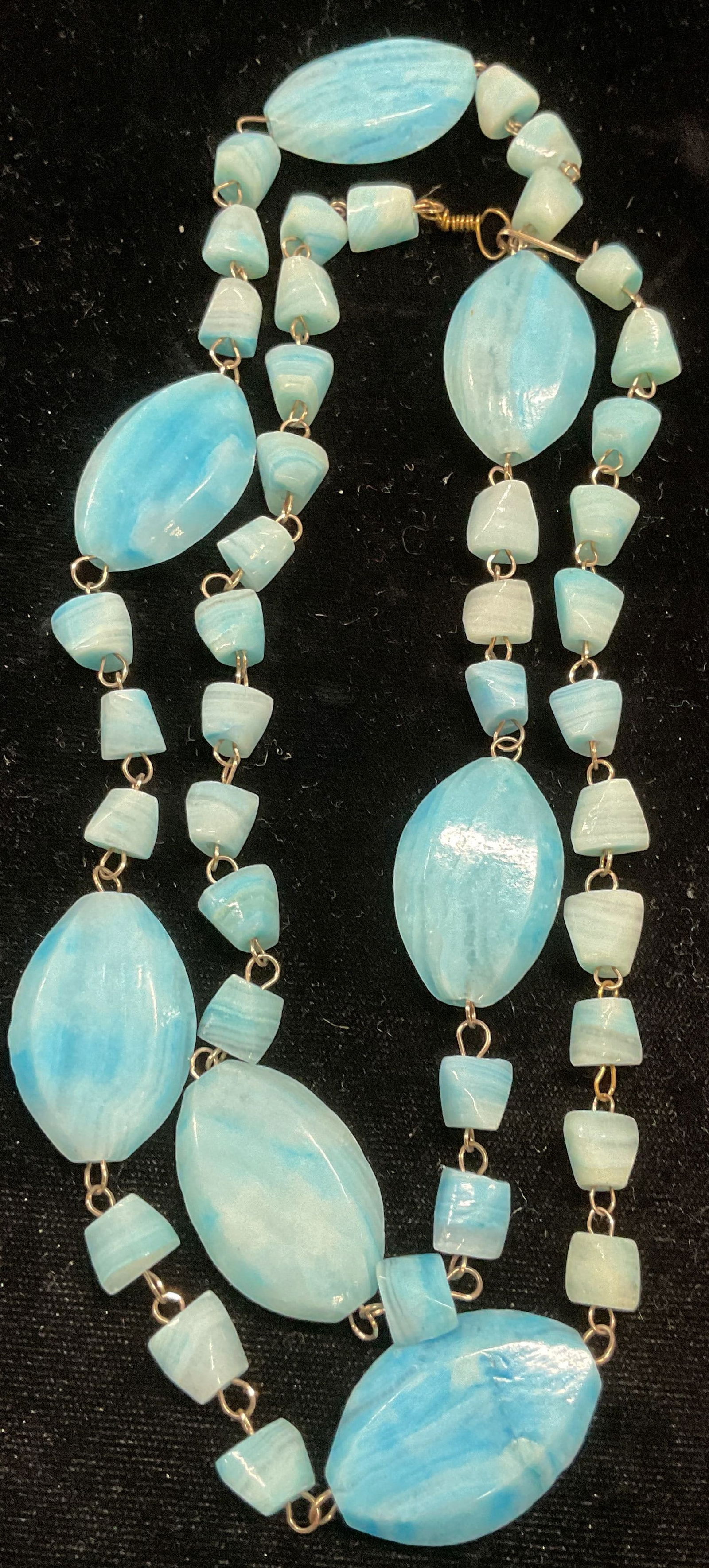 Vintage Blue Semiprecious Beaded Necklace: Vintage semiprecious stone beaded necklace. Appear to be dyed light blue stones. Drop length approx 15 inches. Some wear including scratching observed. Jewelry, estate jewelry, costume jewelry, cockta