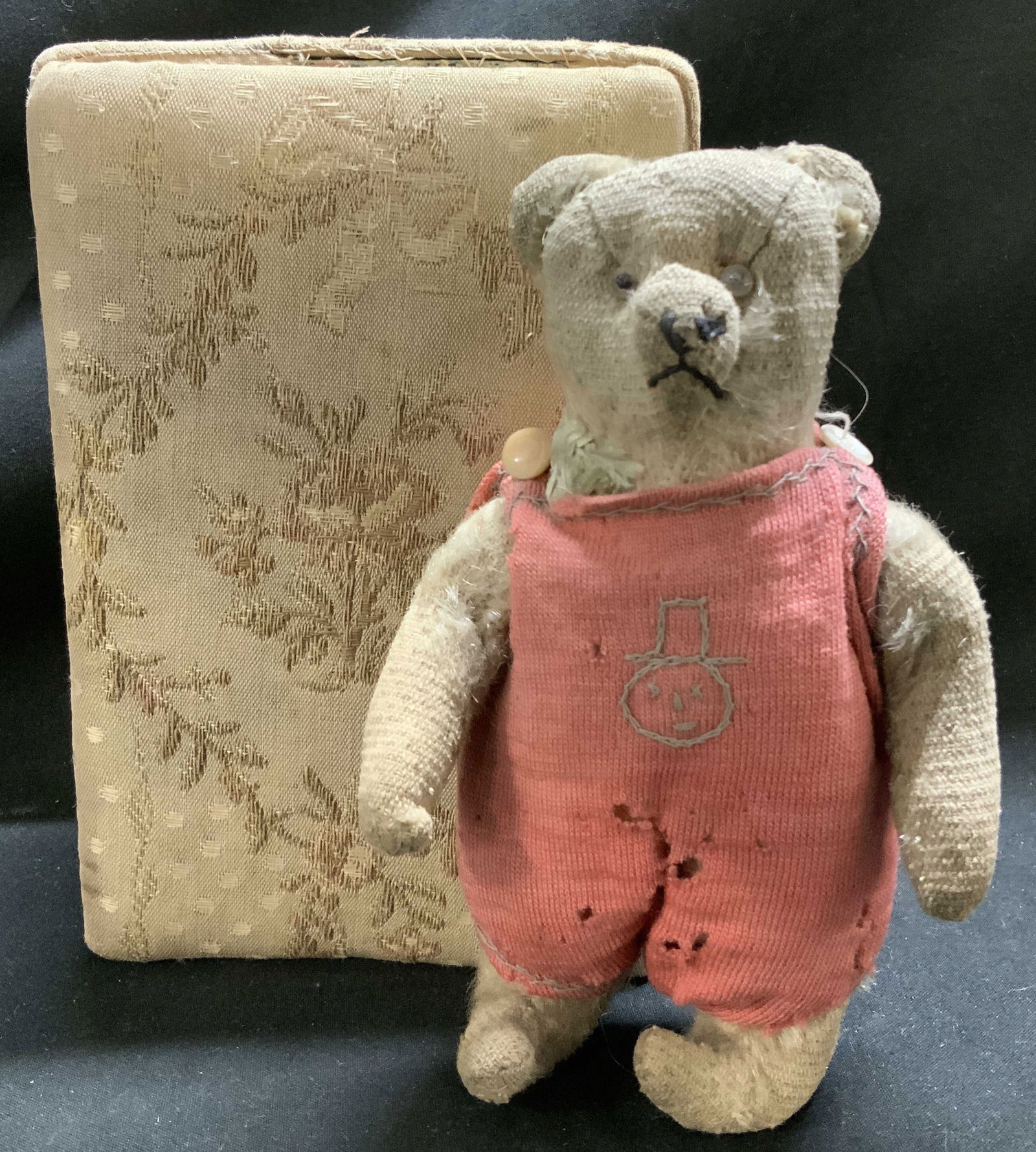 Antique Fabric Covered Box & Cloth Teddy Bear: Antique Fabric Covered Box & Cloth Teddy Bear Lot includes, 1 fabric floral covered box paired with a teddy bear wearing a faded red romper with a stitched face. Appears to be a handmade teddy bear. S