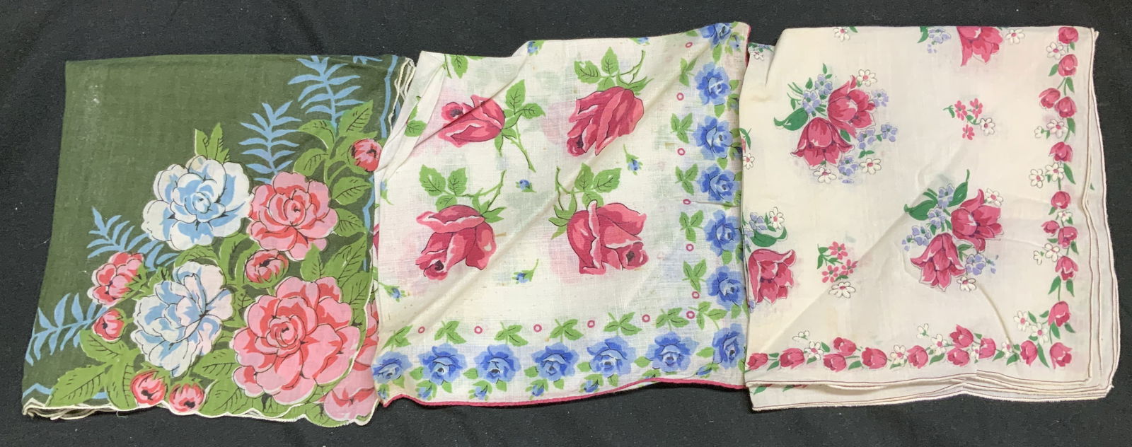Lot 3 Vntg Assorted Floral Linen Handkerchiefs: Handkerchiefs appear to be linen or cotton material. They feature a floral pattern in shades of pink, blue, white & green leaves. Surface wear consistent to age, use & exposure. Measurements: length 1