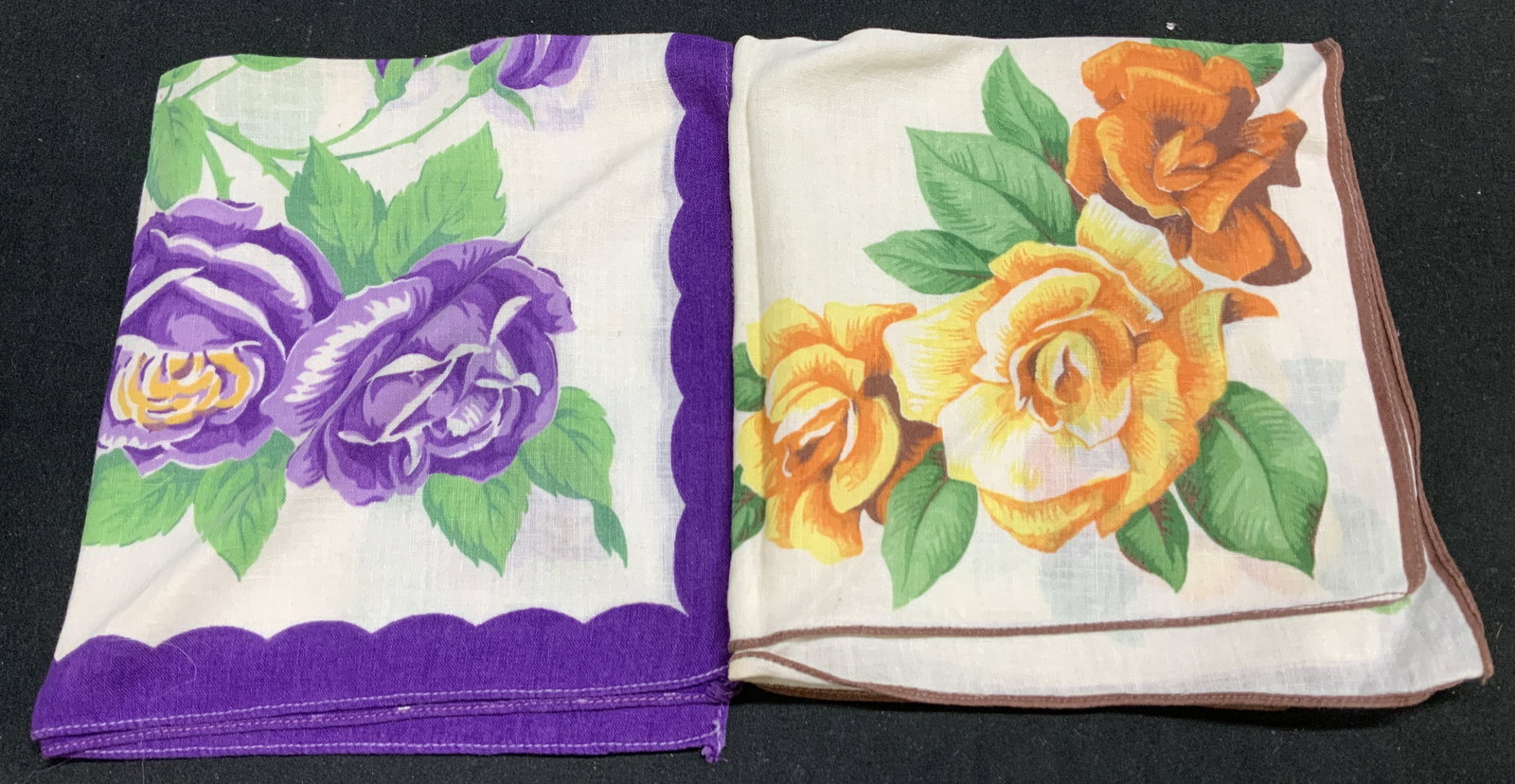 Lot 2 Vntg Floral Print Linen Handkerchiefs: Lot 2 Vntg Floral Print Linen Handkerchiefs Handkerchiefs appears to be linen material. The handkerchiefs feature floral patterns, one with purple roses and the other with orange/yellow roses. Surface